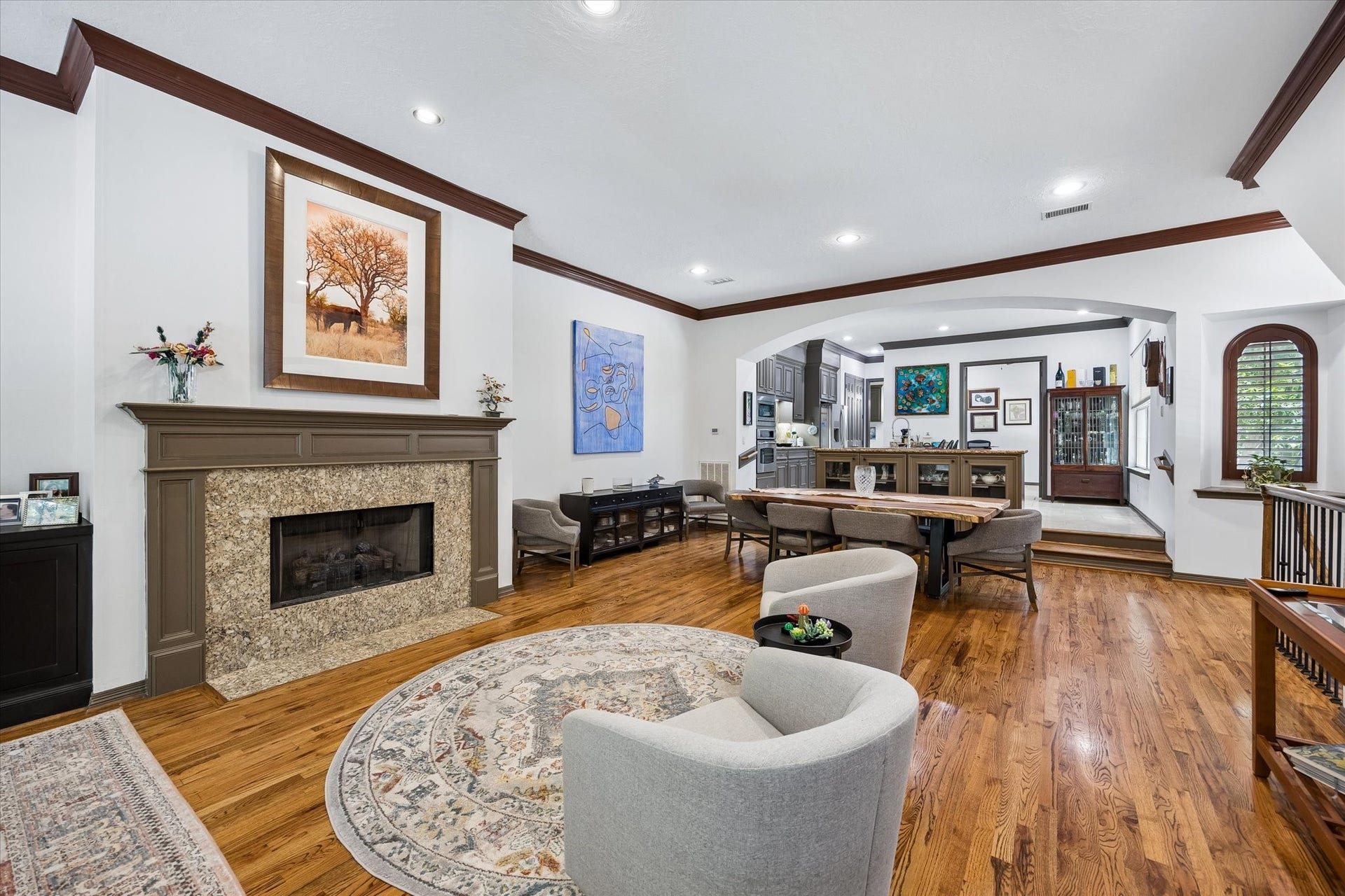 Gorgeous mocha stained crown moulding circles the entirety of the space.