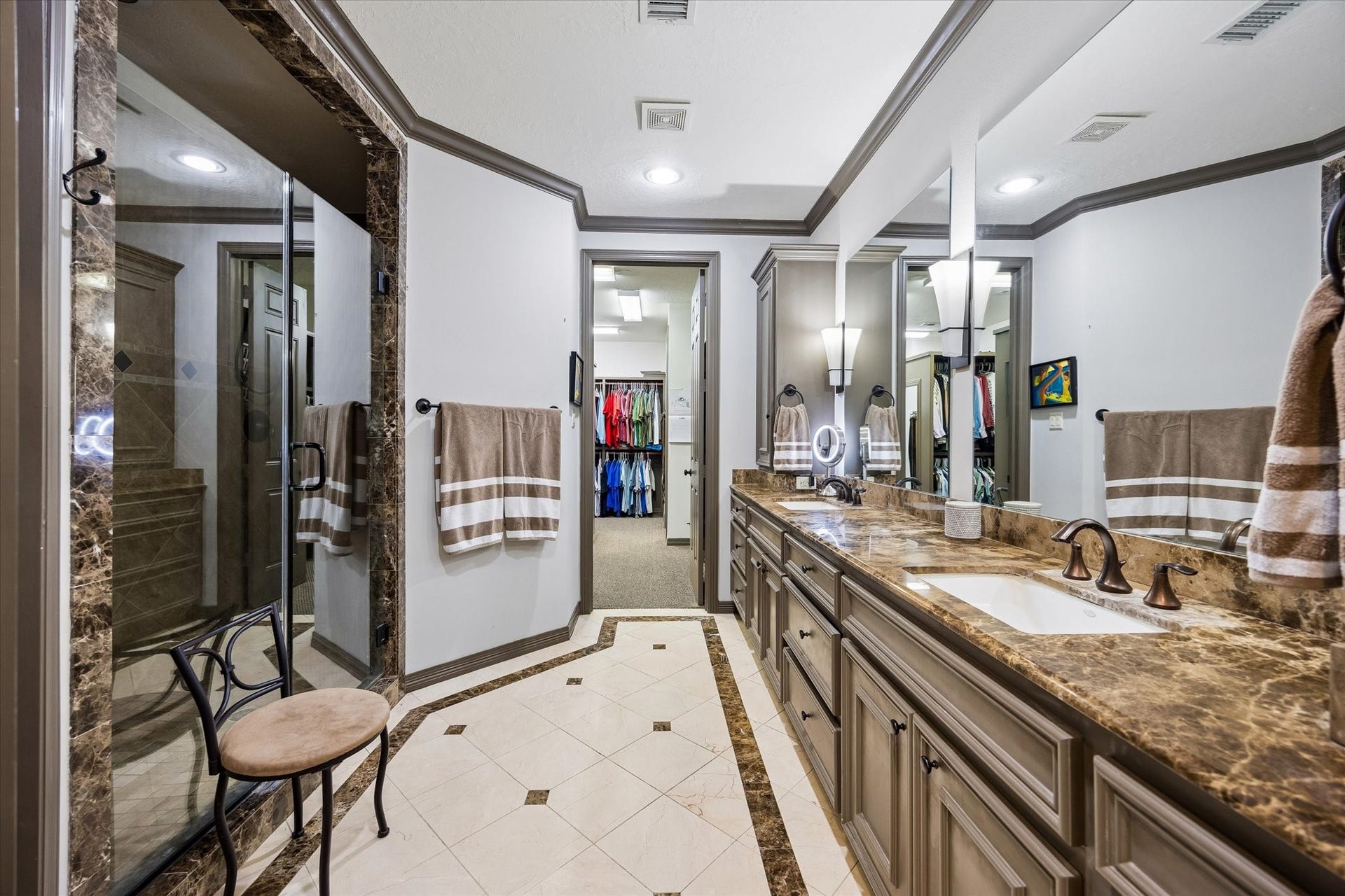 Speaking of fit for royalty...The capacious Master Bath features dual sinks on a super long Vanity, a Texas-sized Shower...