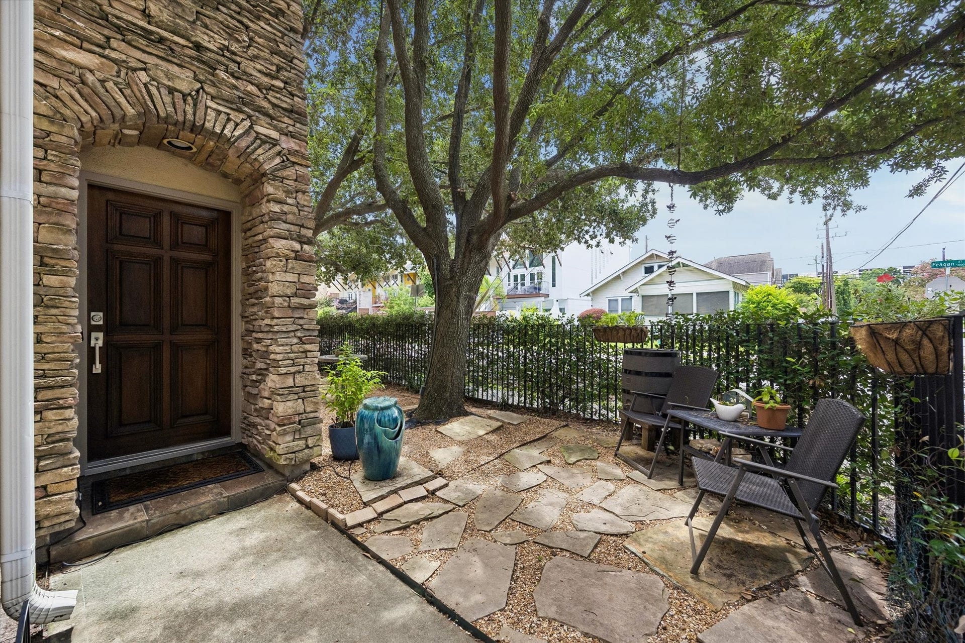 Within the gate is a wraparound Garden that welcomes you to this beautifully maintained home.