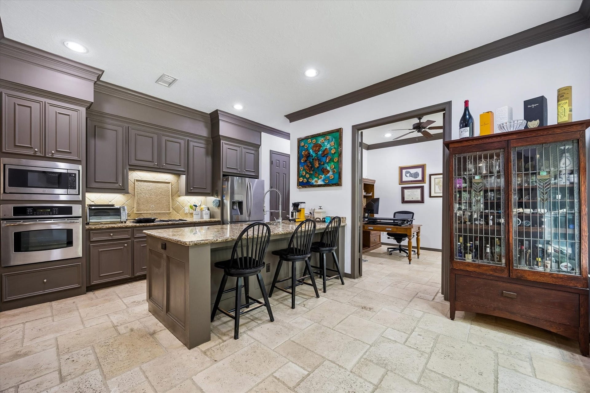 The Kitchen is well equipped with a gas Cooktop, Oven, Microwave and Breakfast Bar.