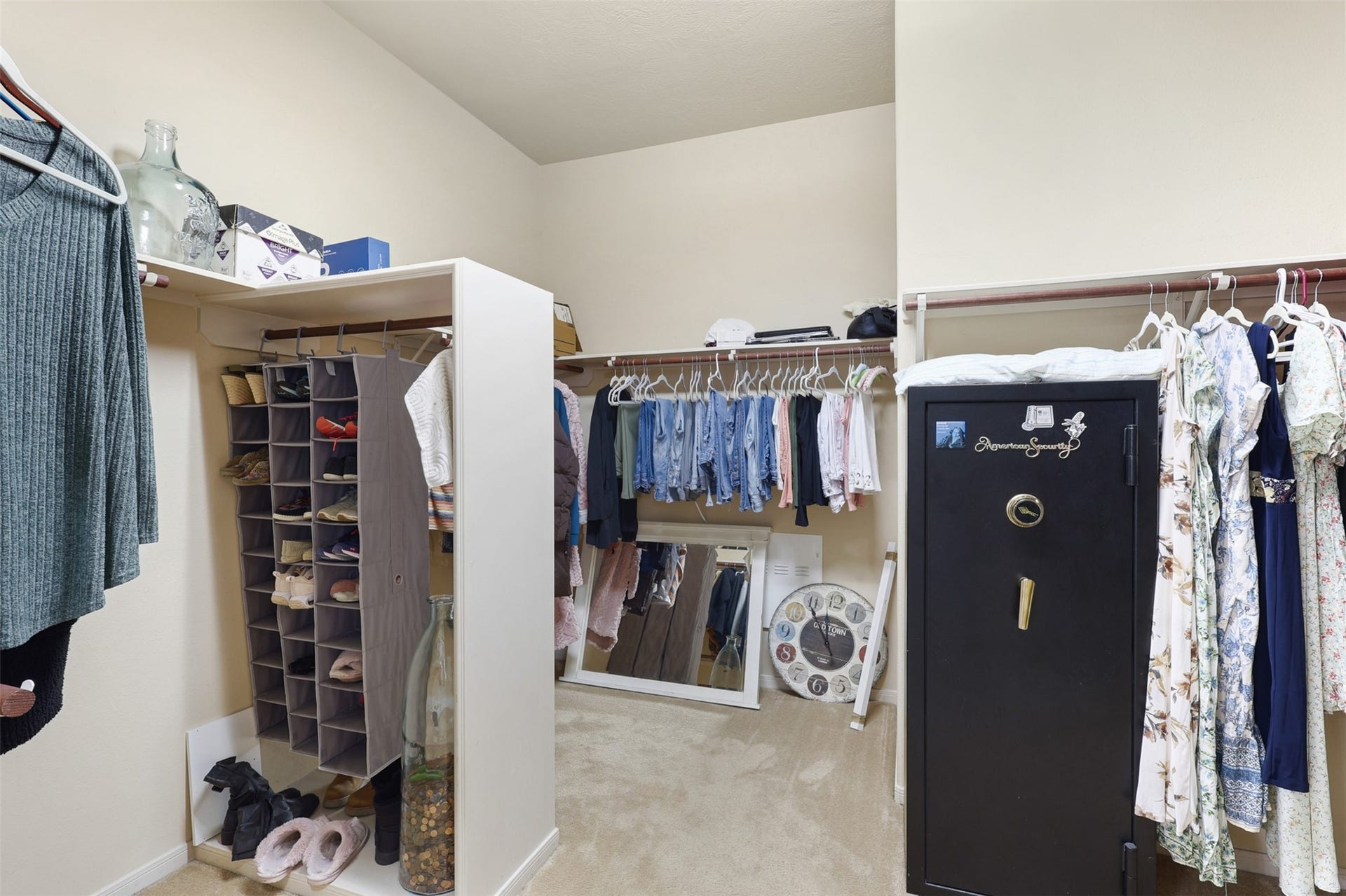 2902 Red Maple Drive, Katy, TX 77494 The expansive walk-in closet offers exceptional storage and organization with multiple hanging areas, shelving, and ample room for seasonal wardrobes, shoes, and accessories.