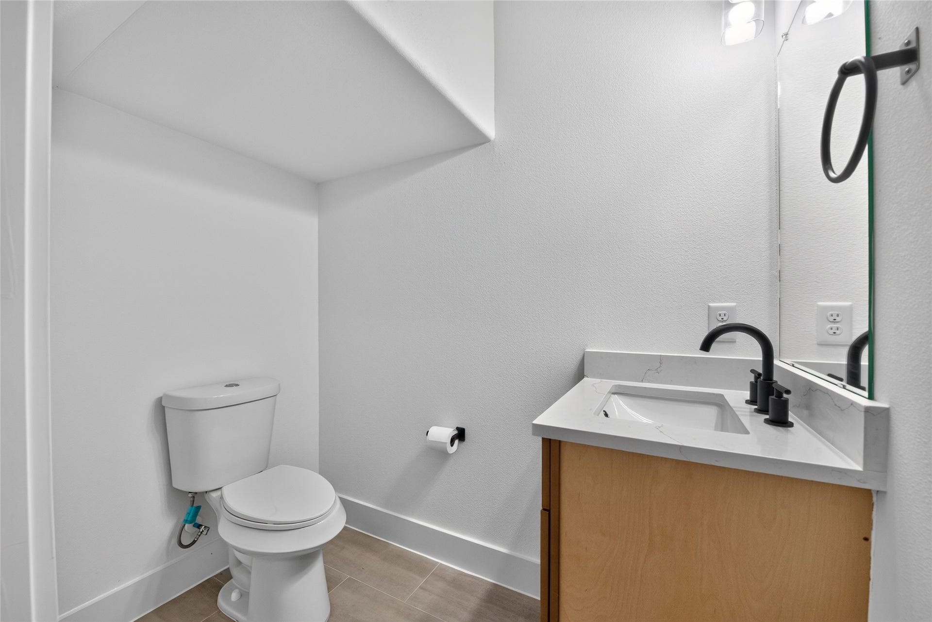 3537 Amos Street, Houston, TX 77021 A generously sized half bath on the main floor, thoughtfully designed for everyday convenience and visiting guests.