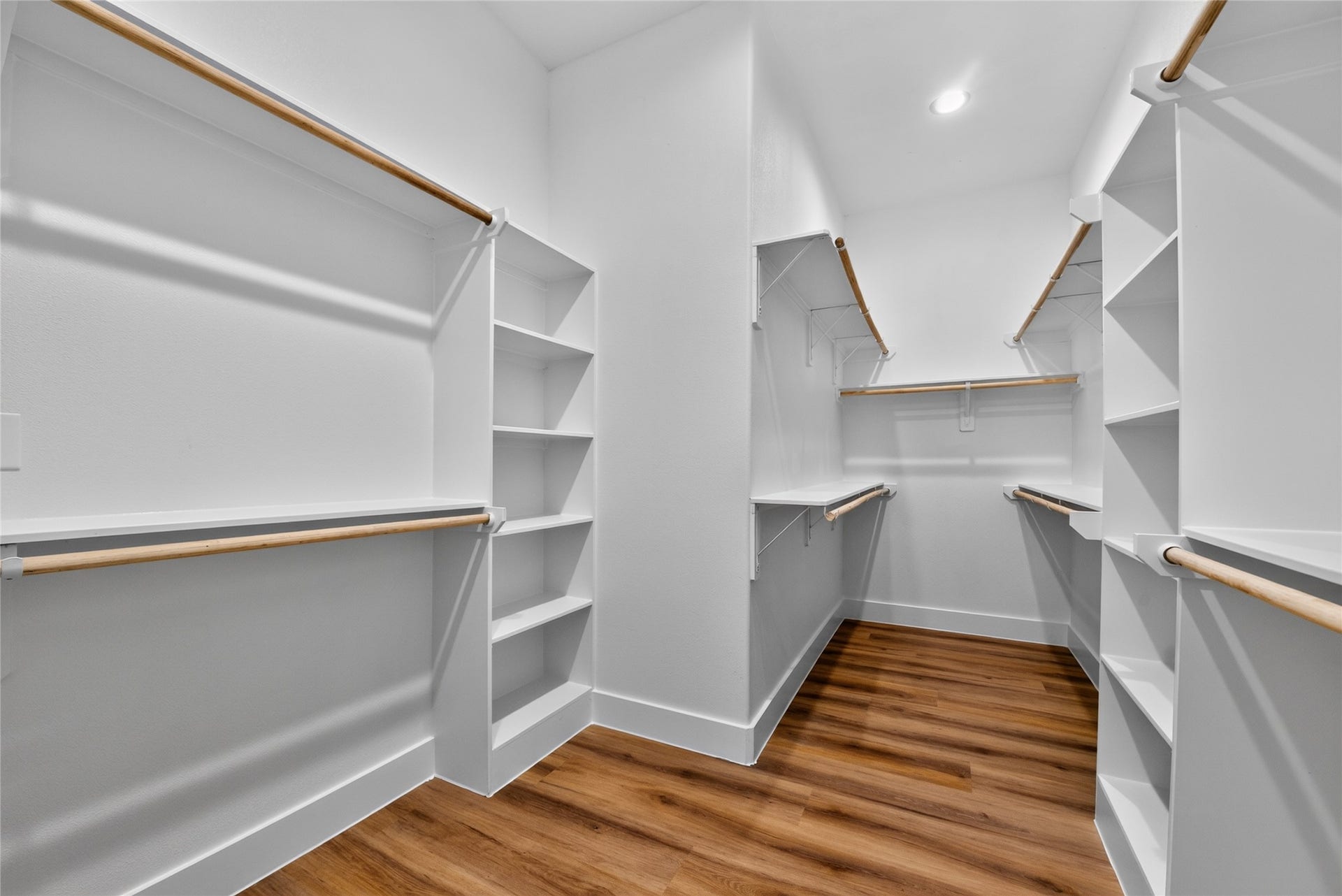3537 Amos Street, Houston, TX 77021 A spacious primary closet with walls of storage spacebeautifully organized, generously sized, and designed to keep everything in place.