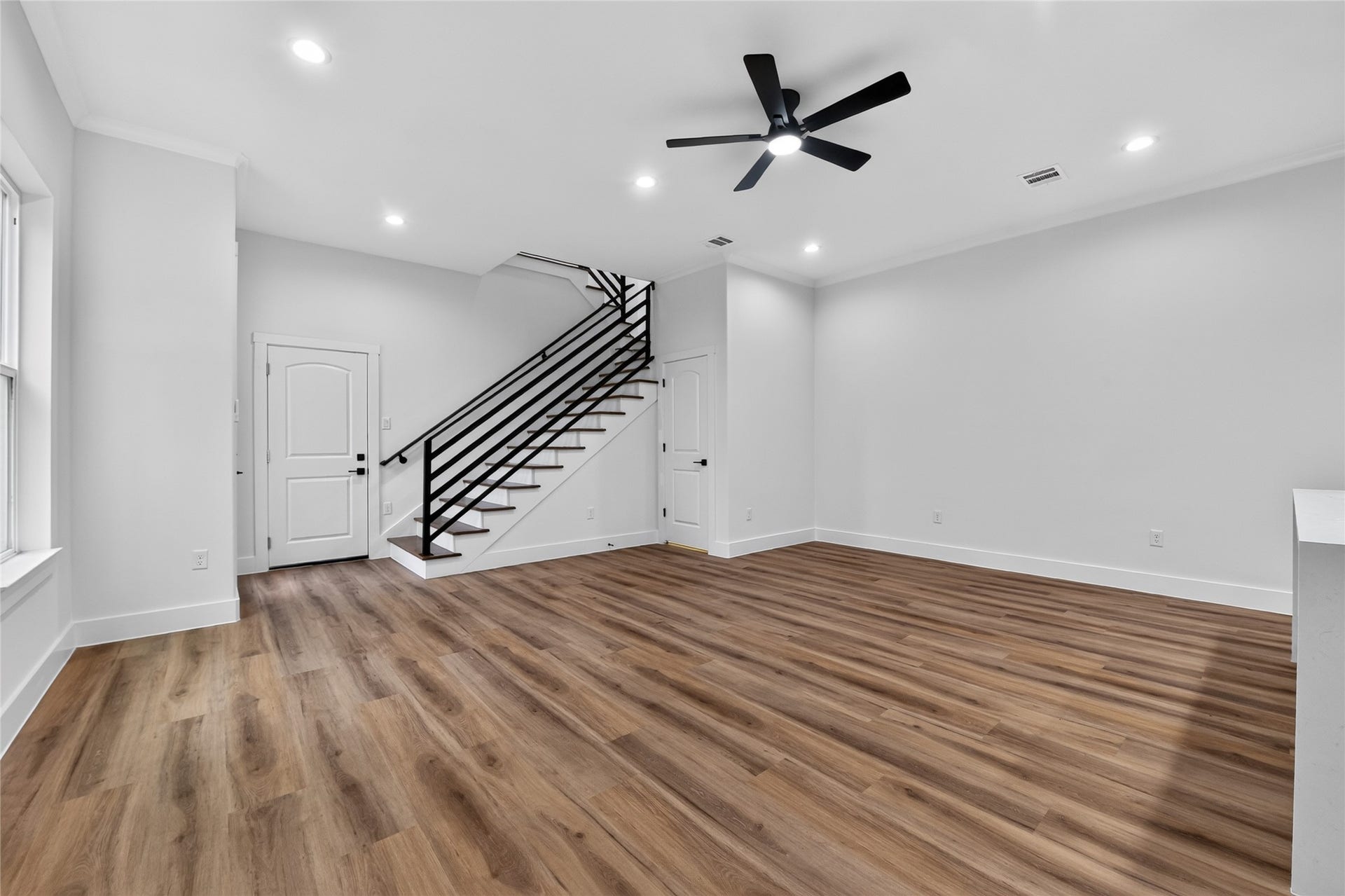 3537 Amos Street, Houston, TX 77021 Thoughtfully designed--convenient garage entry opens directly into the living spaces, while steps to the side lead upstairs to the bedrooms and baths.
