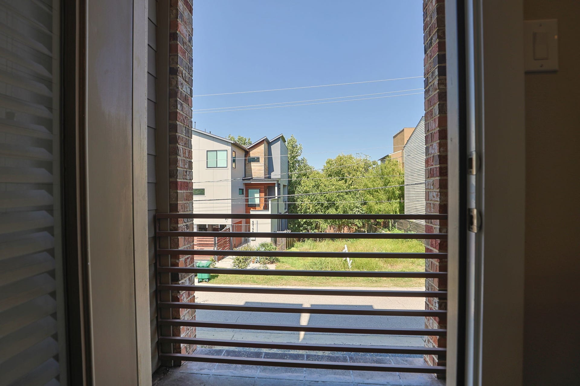 4515 Cornish Street, #A, Houston, TX 77007 2nd floor balcony has a view of the trees across the street. Room for a bistro table to relax at sunset.