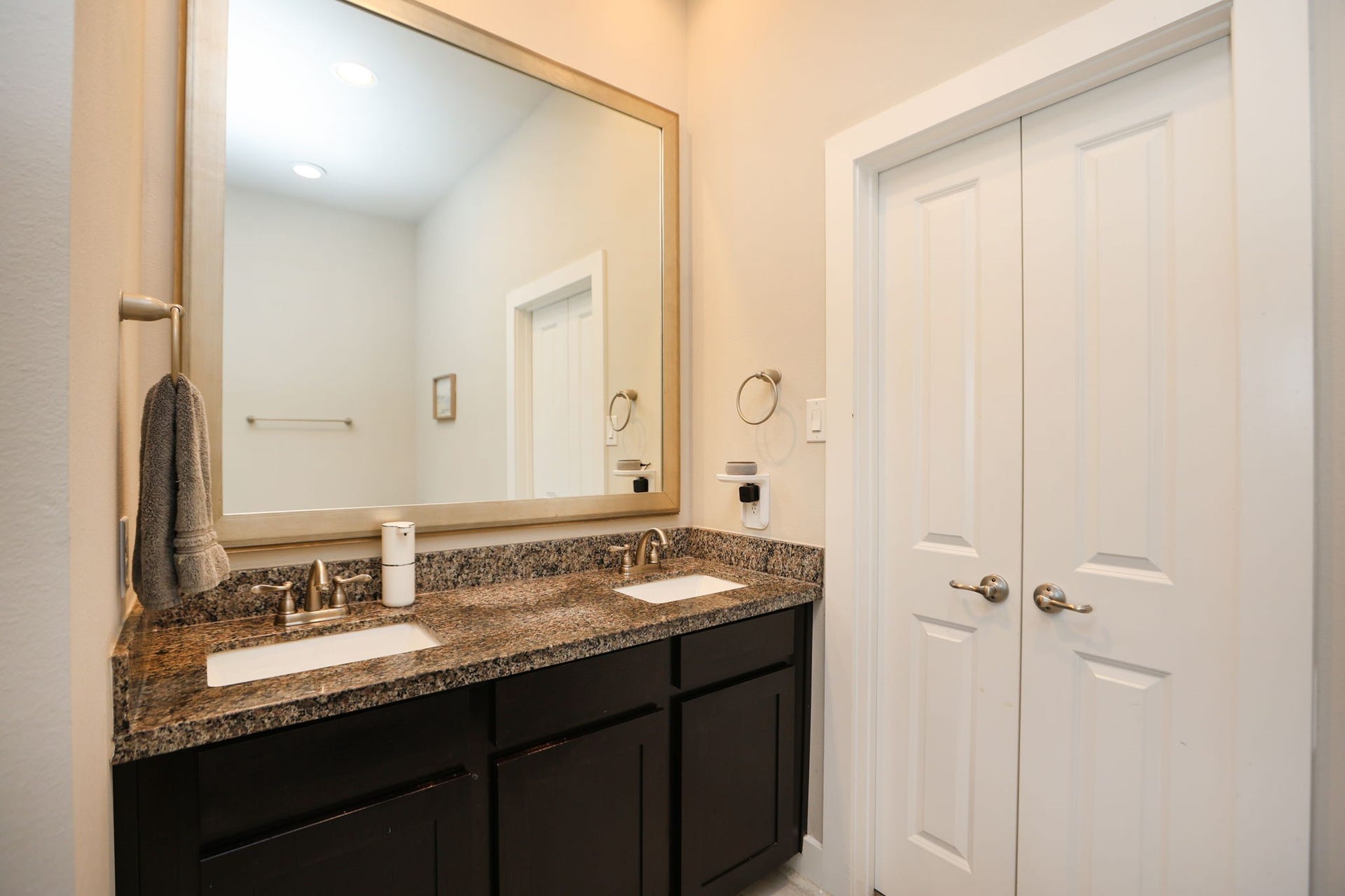 4515 Cornish Street, #A, Houston, TX 77007 Double vanity in primary bath with double doors to your large closet. Behind you is your soaking tub and glass-enclosed shower.