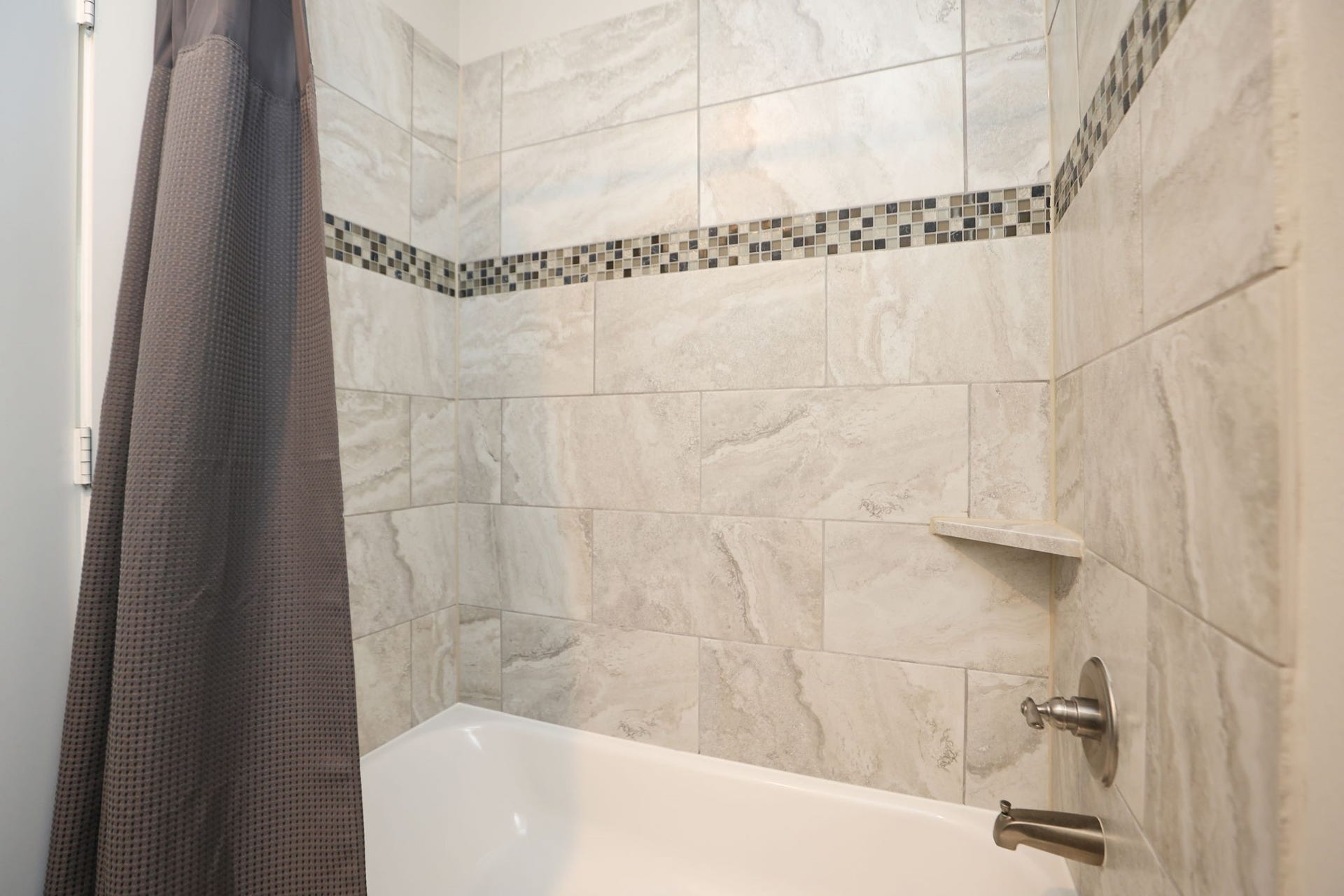4515 Cornish Street, #A, Houston, TX 77007 Whole home has modern tile work and cool, neutral colors - ready for your personal palette and decor!
