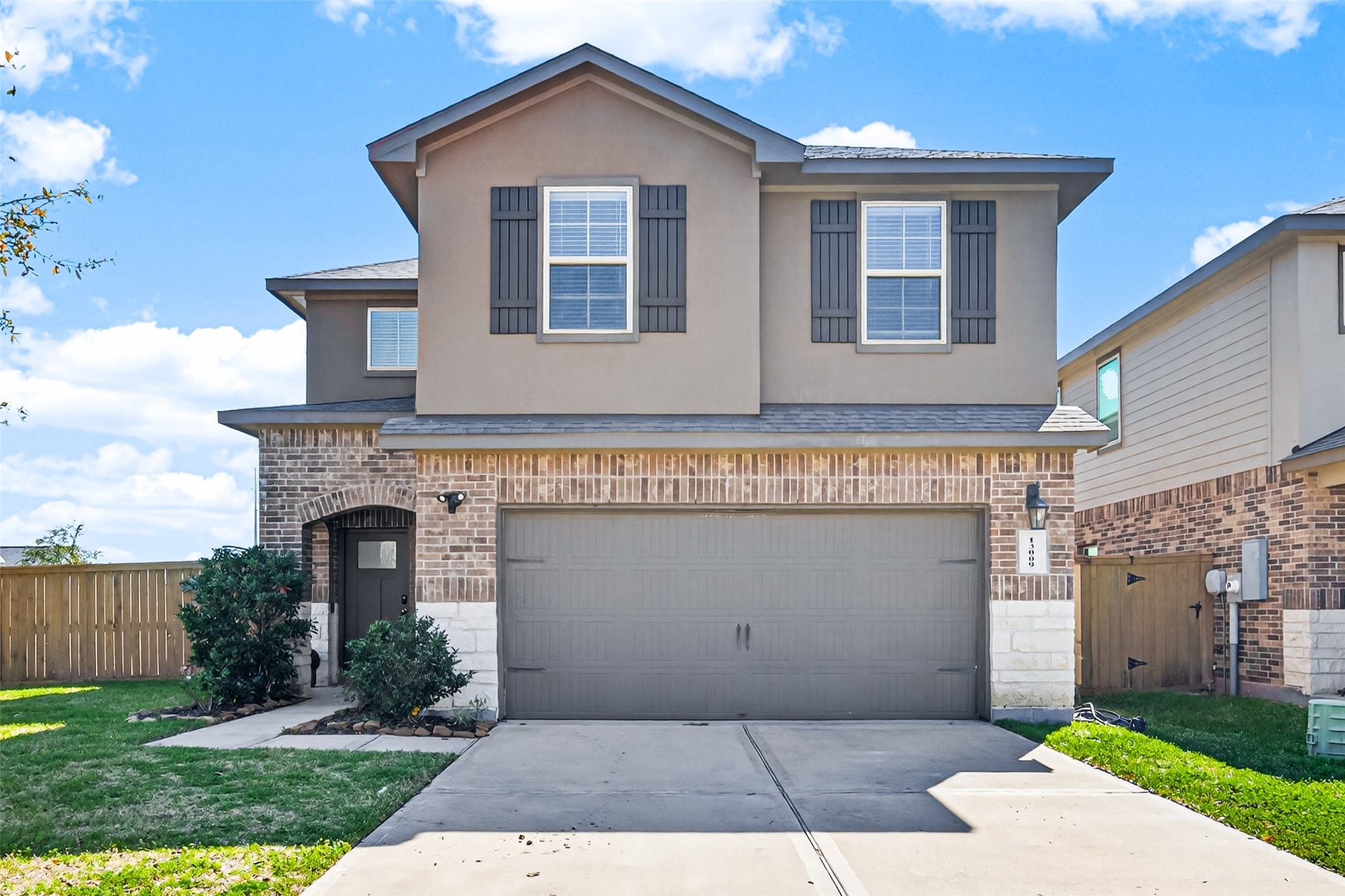 13009 Leisure Cove Drive, Texas City, TX 77568 Beautiful curb appeal and a welcoming front entrance.