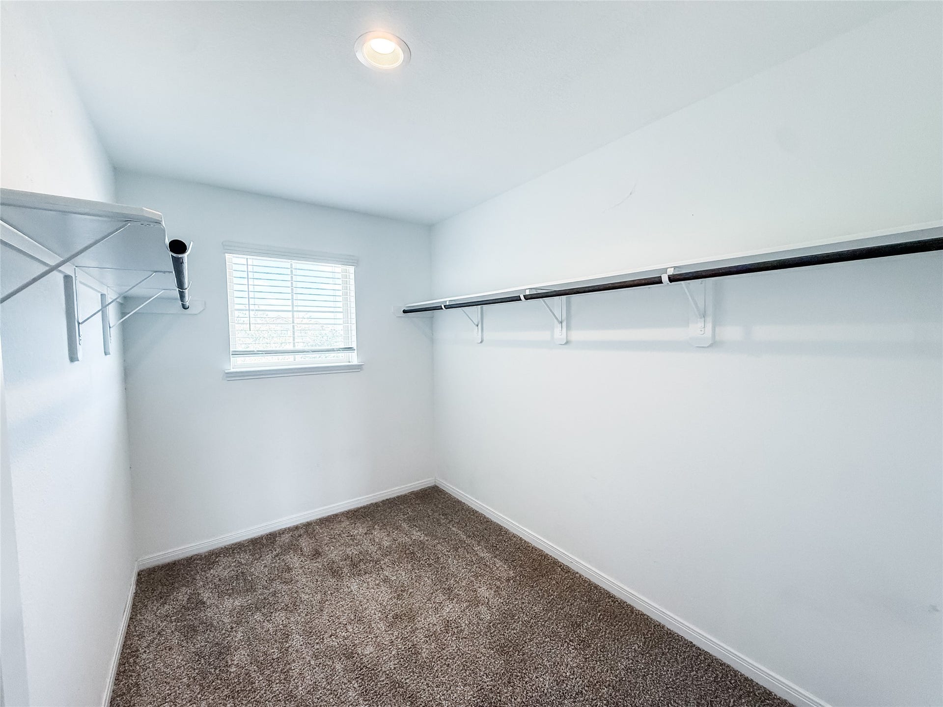 13009 Leisure Cove Drive, Texas City, TX 77568 Spacious walk-in closet with plenty of storage space.
