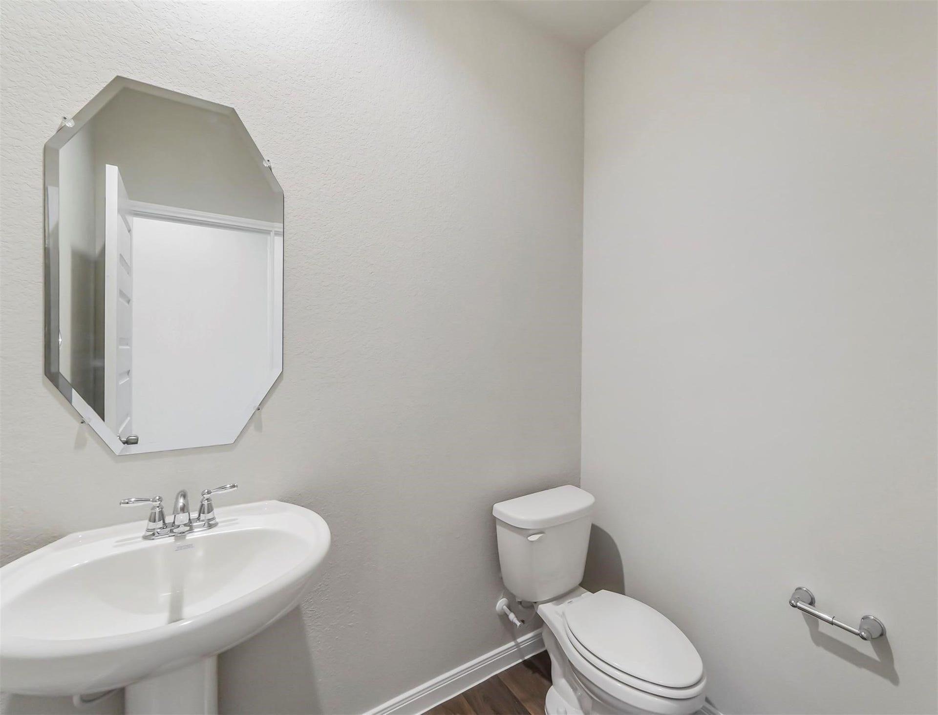 13009 Leisure Cove Drive, Texas City, TX 77568 Conveniently located downstairs half bath for guests.
