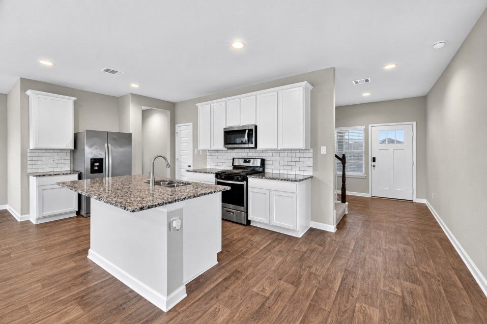 13009 Leisure Cove Drive, Texas City, TX 77568 Open kitchen with ample counter and cabinet space.