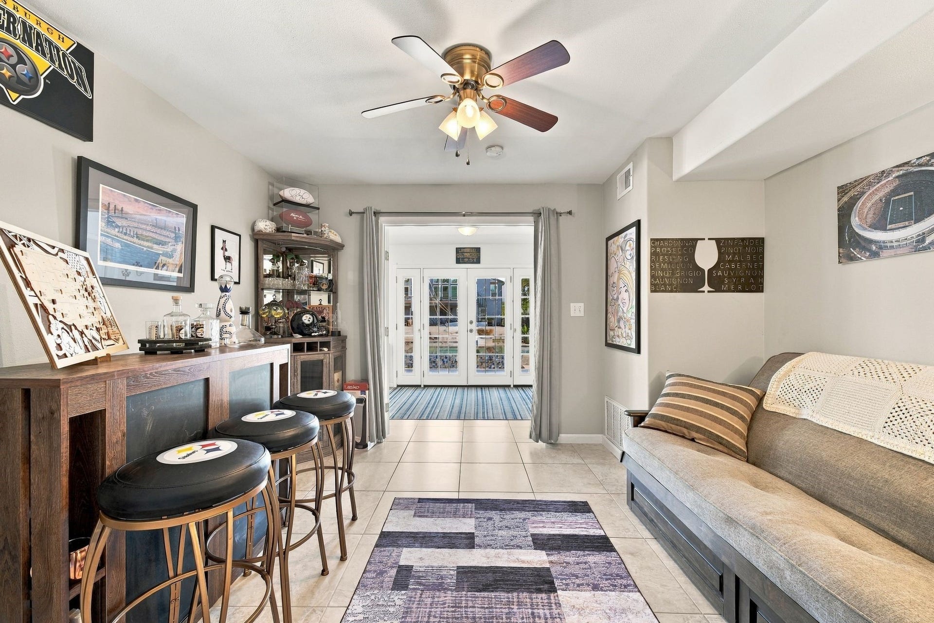 10 Harbor Lane, Kemah, TX 77565 This charming entertainment space is the perfect lounge to watch the game while overlooking the pool and waterfront through elegant French doors.