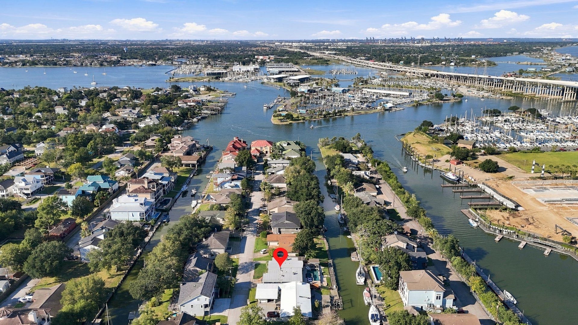10 Harbor Lane, Kemah, TX 77565 Experience waterfront living in this vibrant canal-side community, offering easy access to open water and scenic views of the marina and surrounding landscape. Perfect those seeking a serene coastal lifestyle.