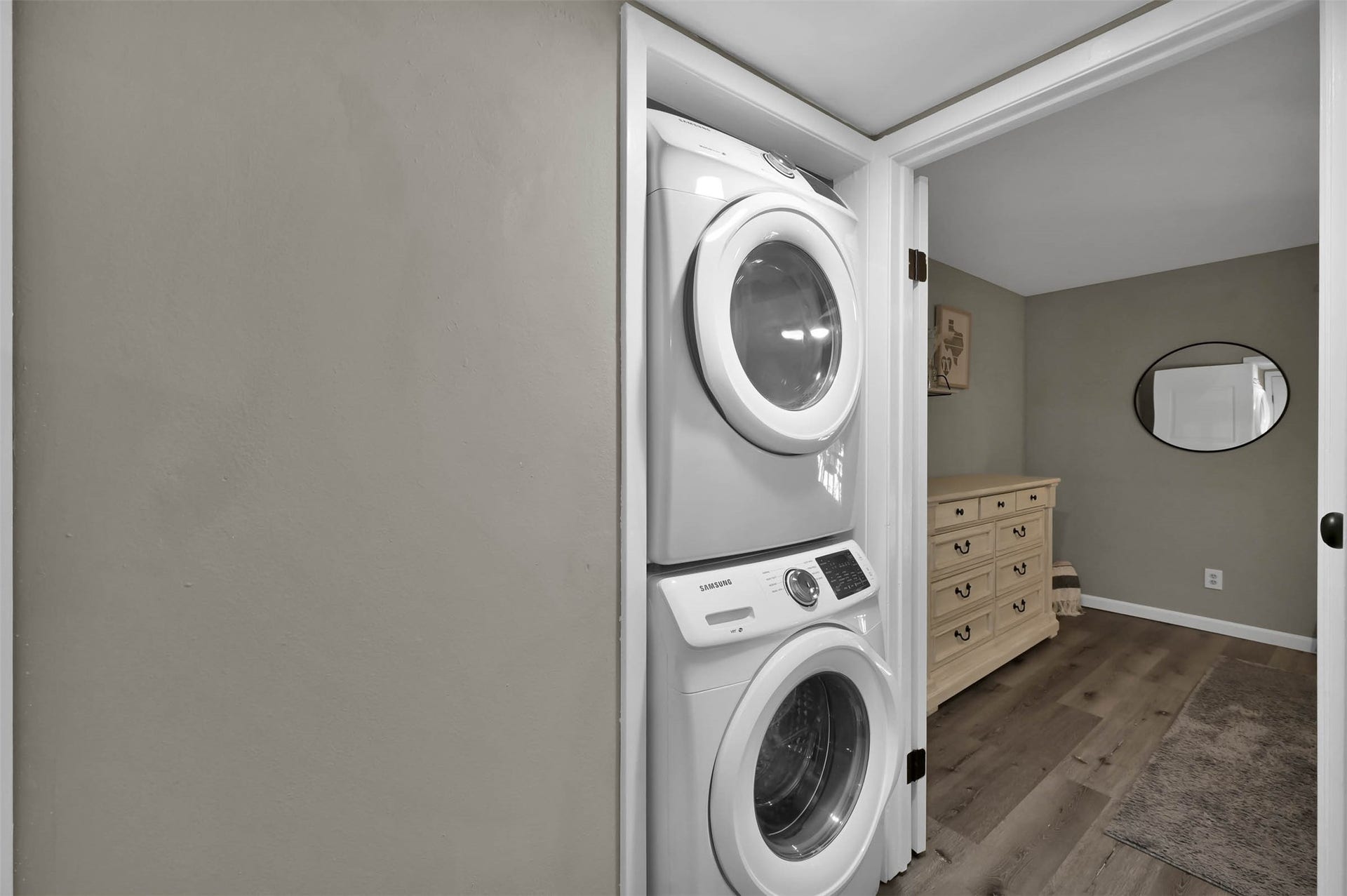 Stacked washer / dryer outside of 
Primary bedroom
