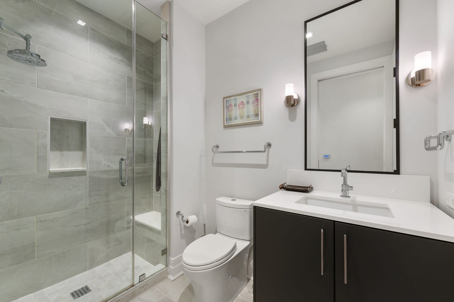 6017 Memorial Drive, #305, Houston, TX 77007 Polished glass-enclosed shower and clean contemporary lines.