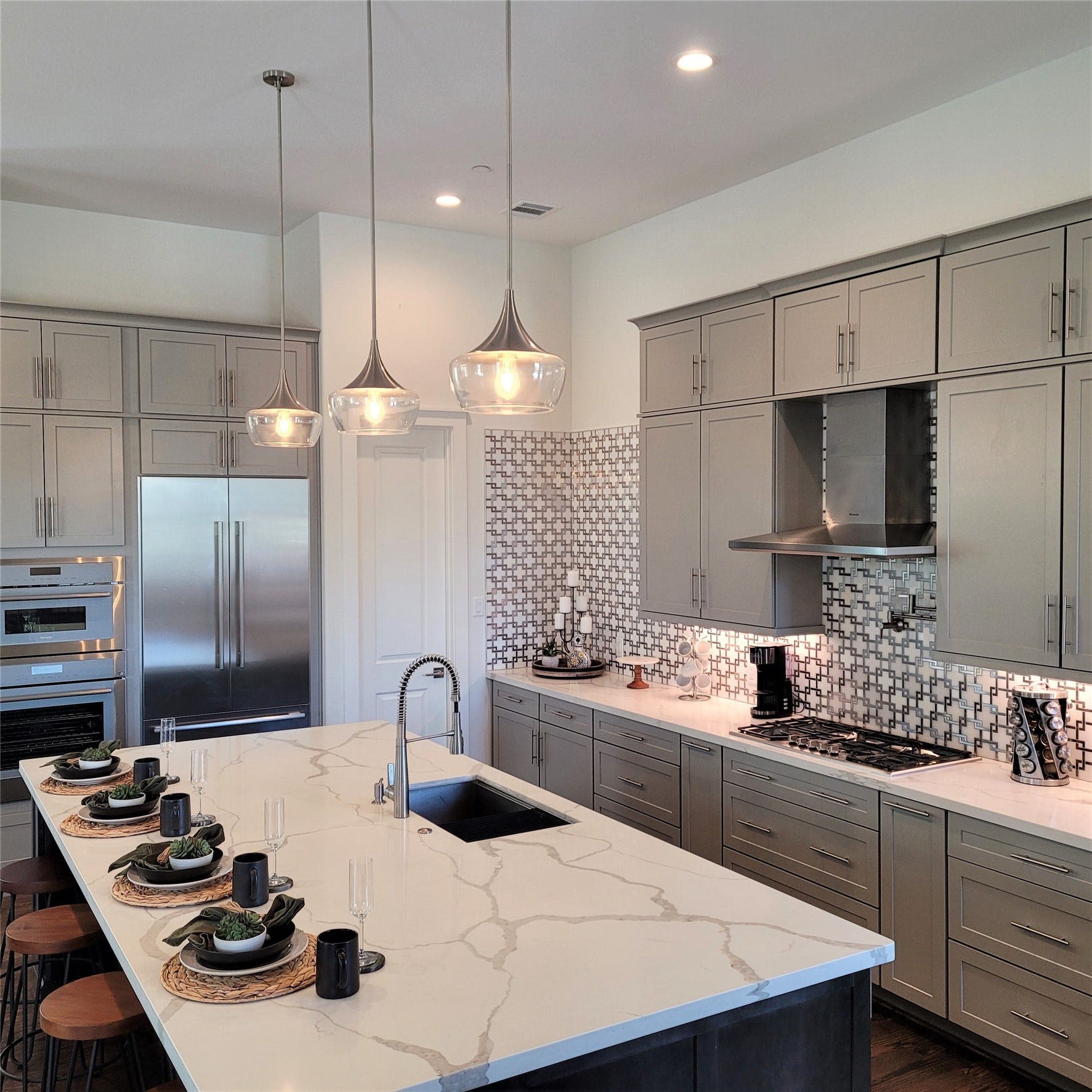 Incredible kitchen with large island and Thermador appliances. Comfort your cooking with a pot filler, deep ss sink, convection double oven and a wine fridge