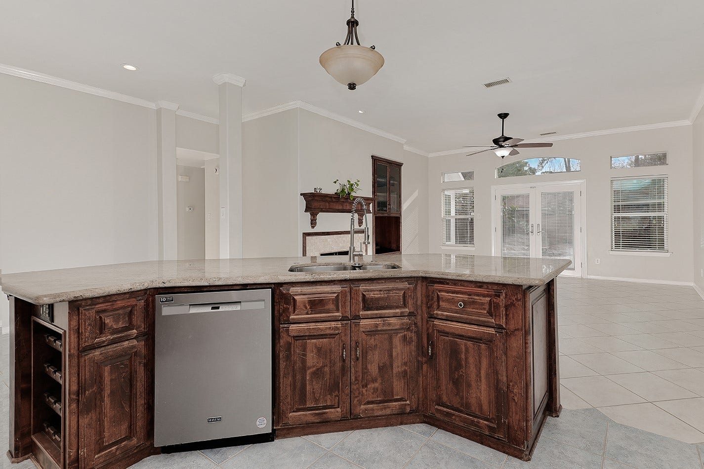 34 Cypress Bayou Court, The Woodlands, TX 77382 This photo showcases a spacious open-concept kitchen and living area.
