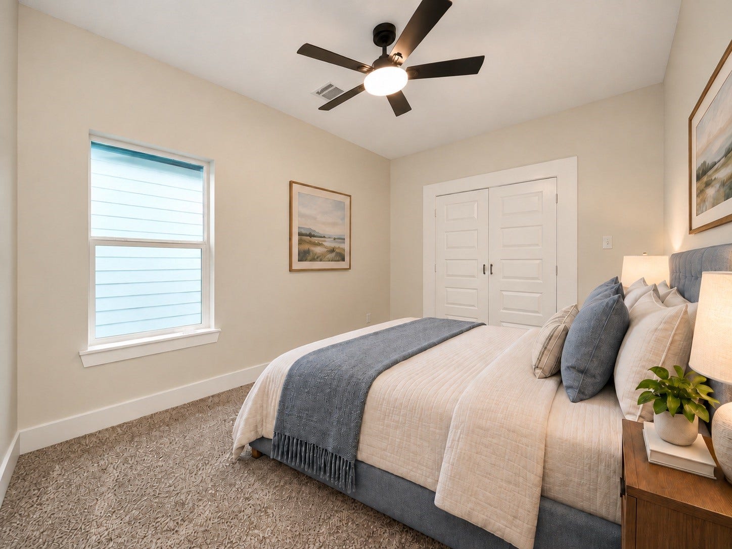6628 Nielan Street, Houston, TX 77028 This second-floor secondary bedroom measures approximately 14 x 10 feet and features a ceiling fan, natural light, and a neutral color palette. The room is conveniently located near the shared bathroom. | Virtually Staged