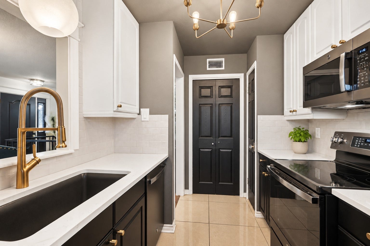 Two pantries offer plenty of room for storage and that SINK!!! Wowza!