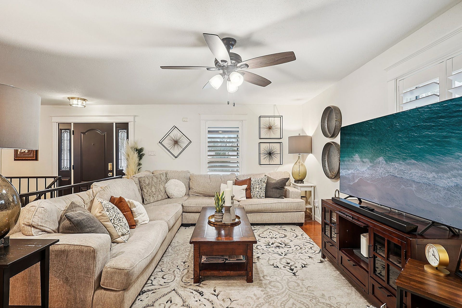 That couch fits perfectly in this space and makes it so cozy. Can you see yourself relaxing here on the weekend watching moves or taking a nap?