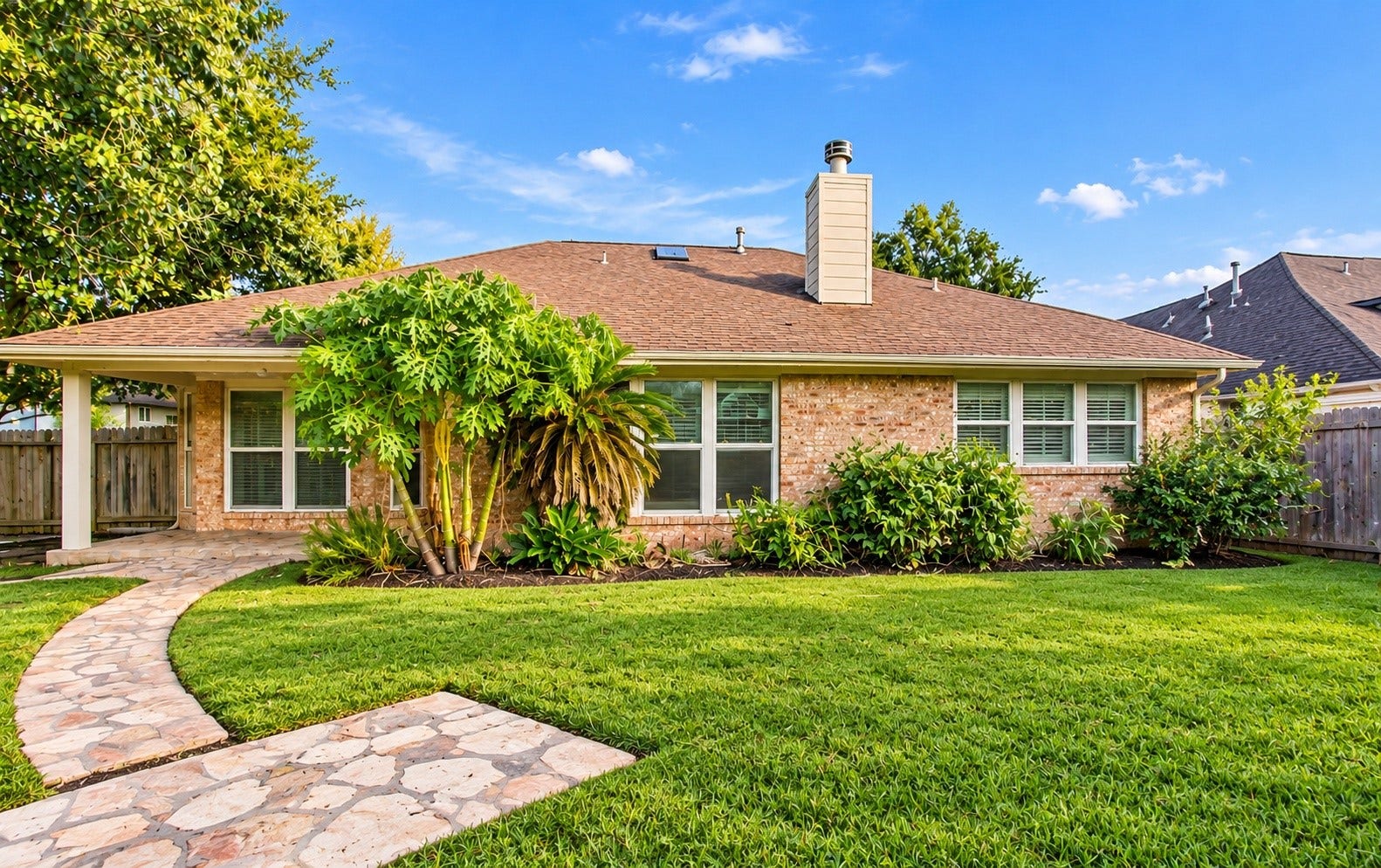 The back of the home features a covered patio!