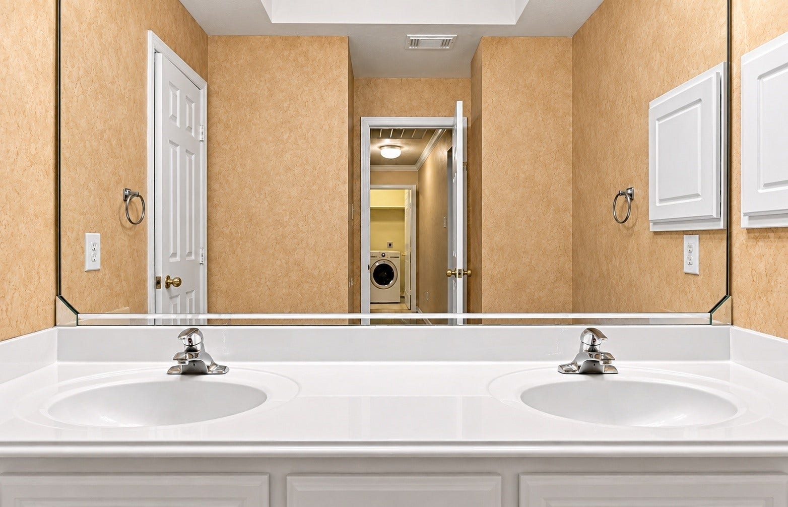 The secondary bathroom also has double sinks!
