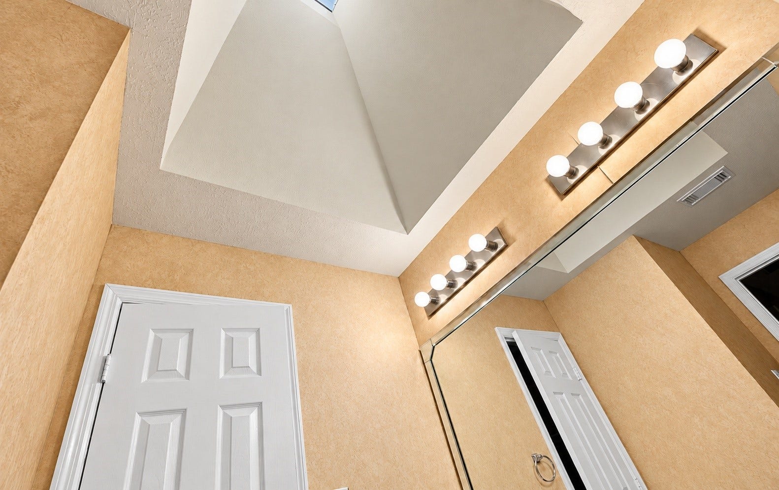 The secondary bathroom has a skylight that brings in a lot of natural light!