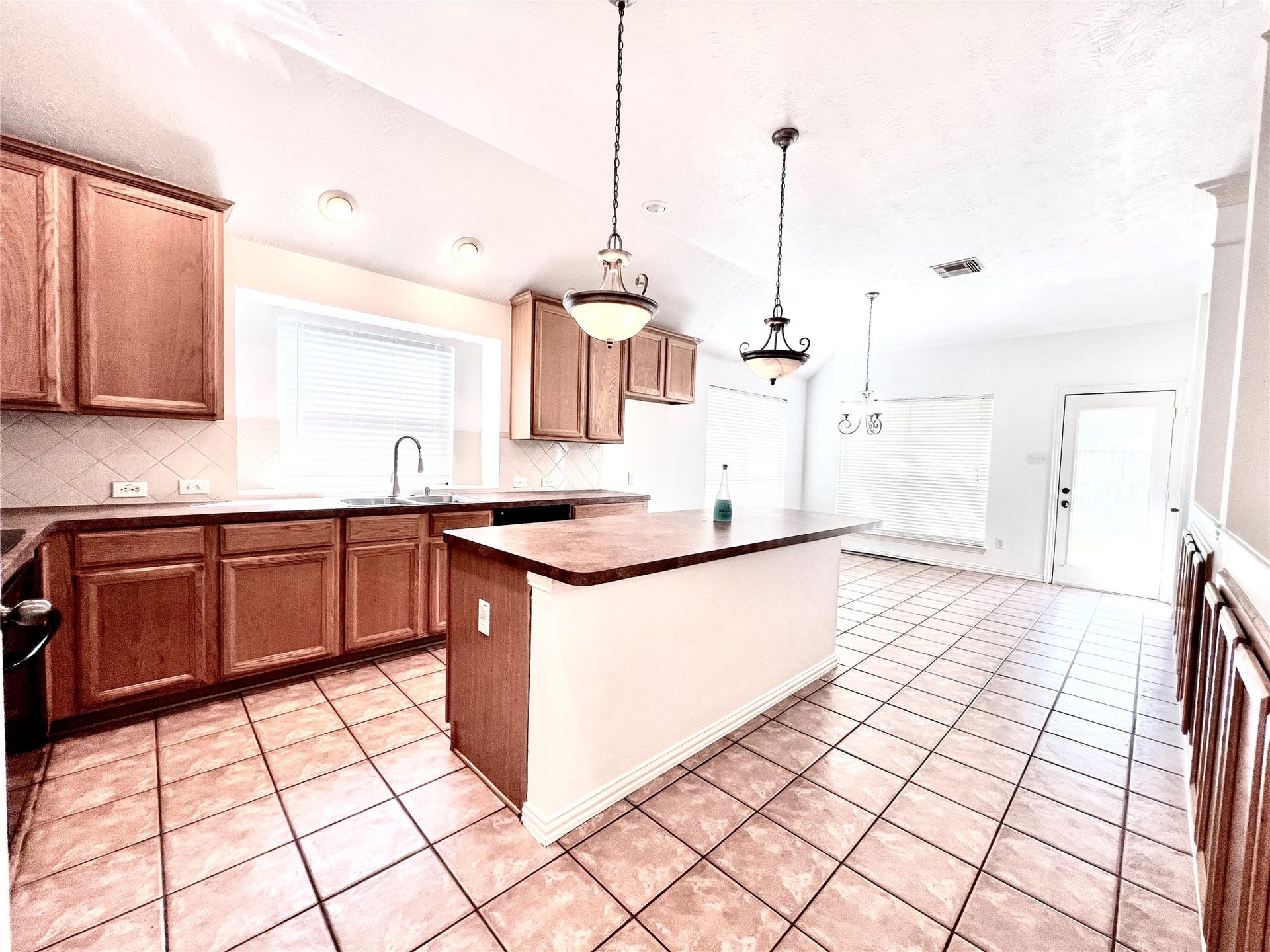 15915 Misty Heath Lane, Houston, TX 77084 Island kitchen with ample cabintes and counter tops