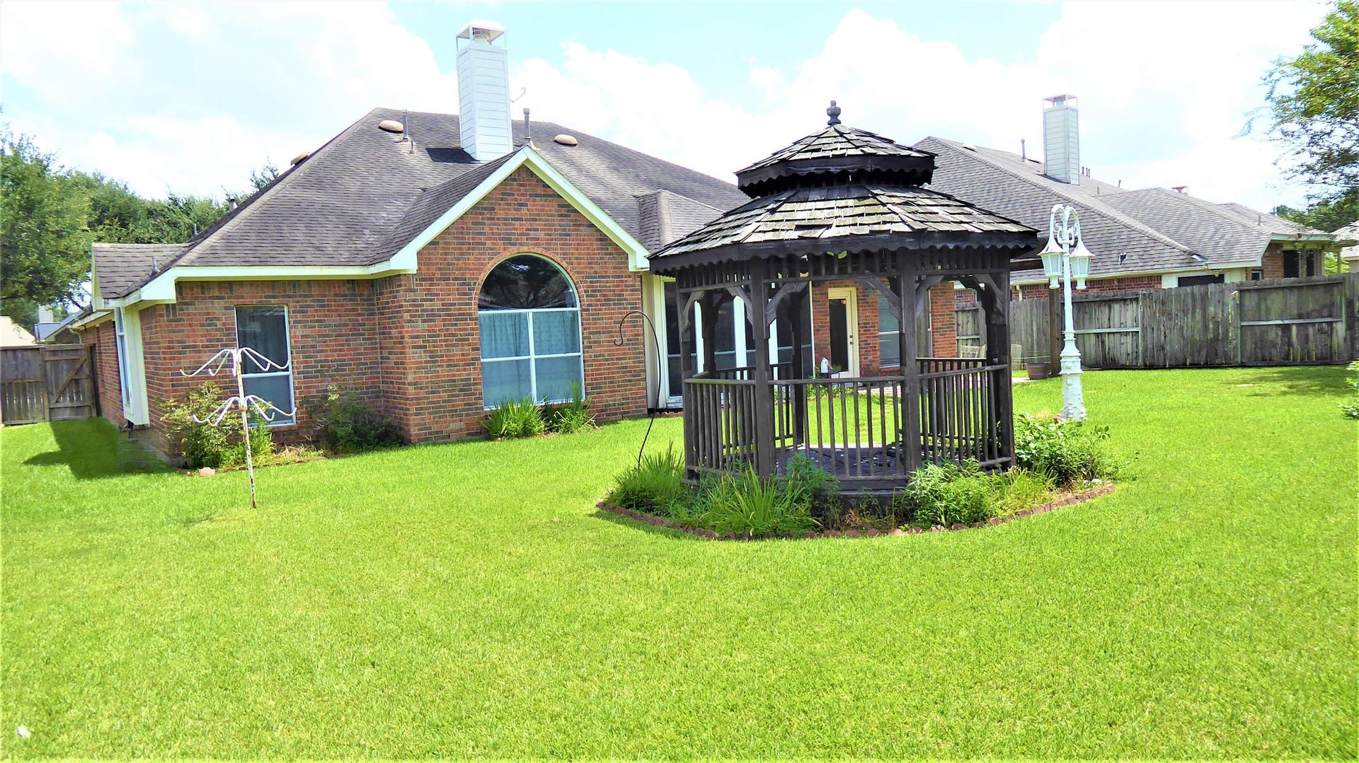 15915 Misty Heath Lane, Houston, TX 77084 Nice big back yard, the Gazebo was taken down due to its condition