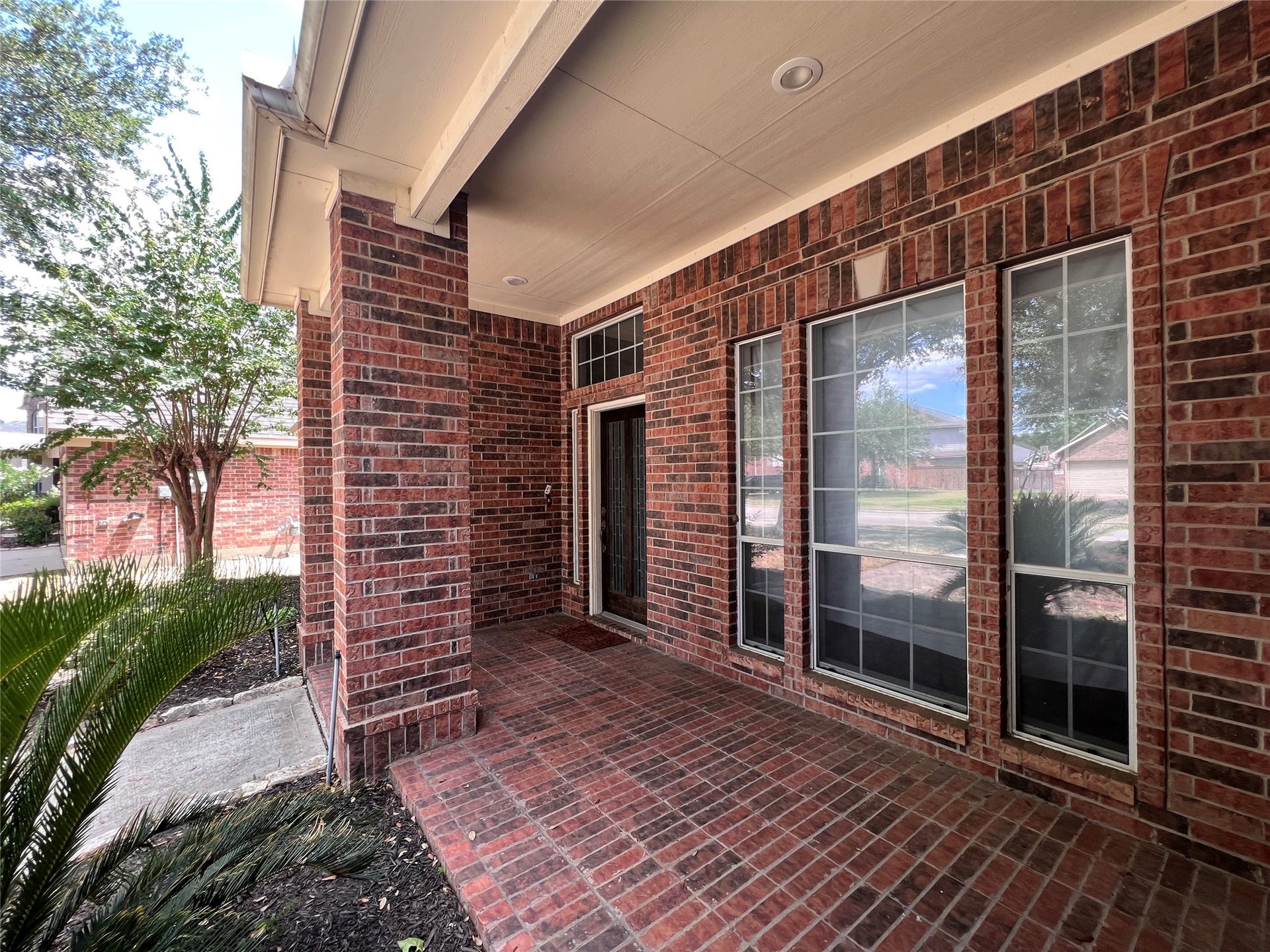 15915 Misty Heath Lane, Houston, TX 77084 beautiful front porch with brick ground cover
