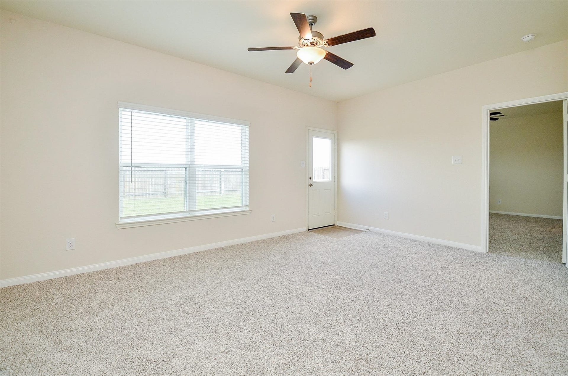 Living Room is access to the Primary Ensuite Bedroom.