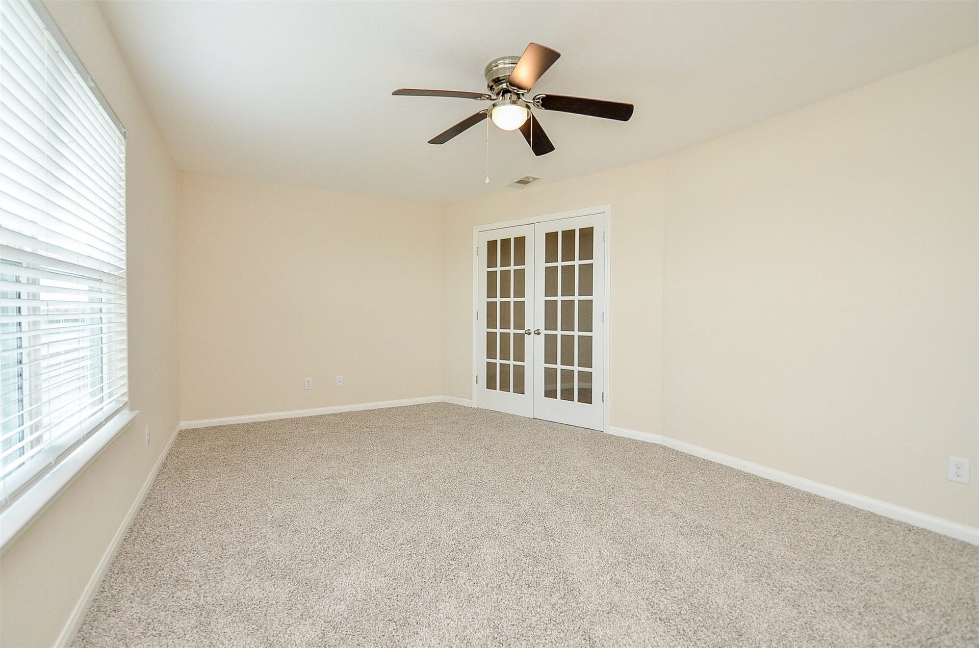 Media Room with French Doors for privacy.