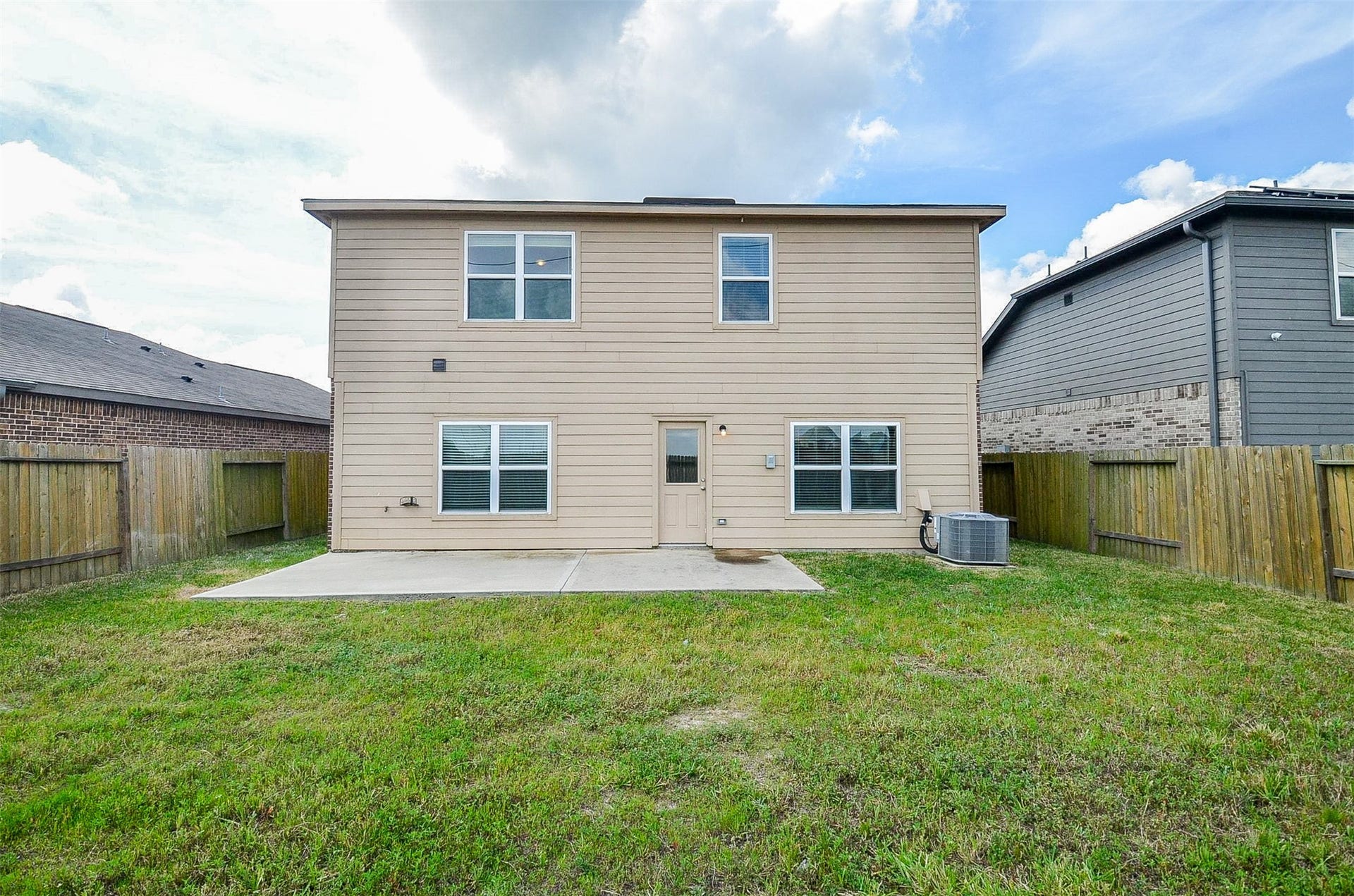 Back elevation includes a large patio/deck for rest, and relaxation.
