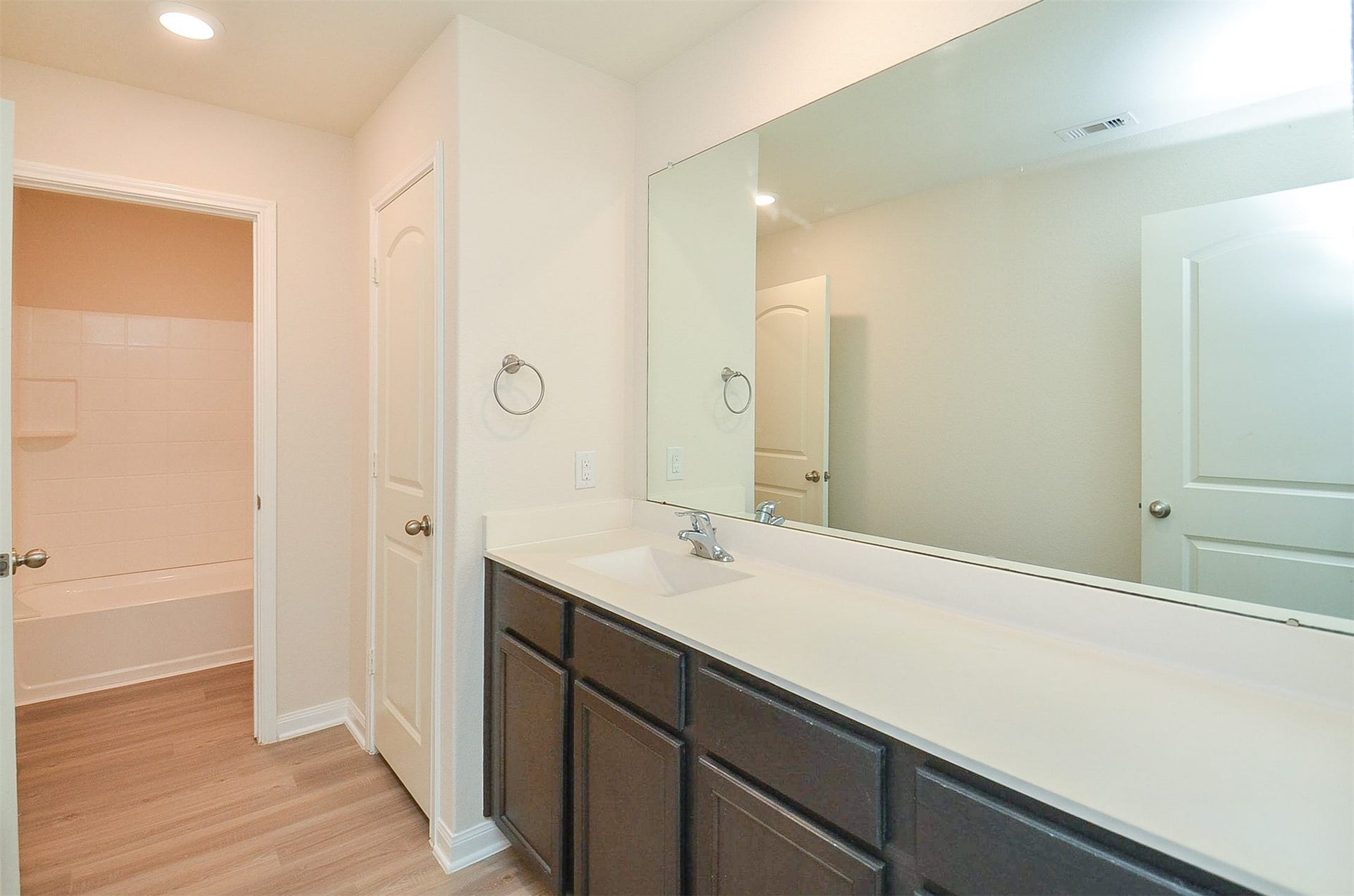 Full tiled surround Shower/Bath, Luxury Vinyl Flooring.