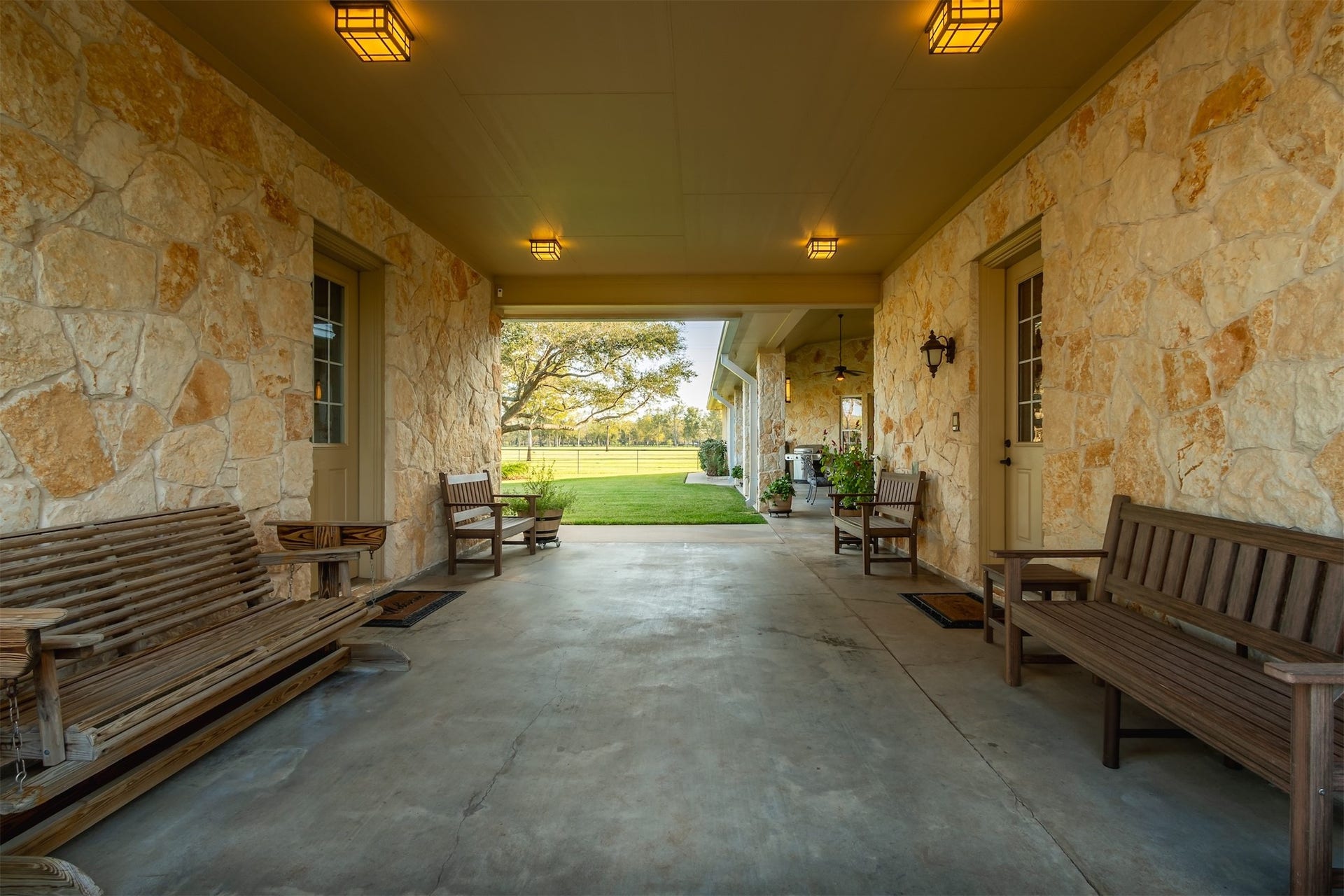 3150 Holmes Road Road, Richmond, TX 77406 Experience elegance and convenience with this charming porte-cochere, offering a sheltered entrance, country breezes, and an inviting ambiance.
