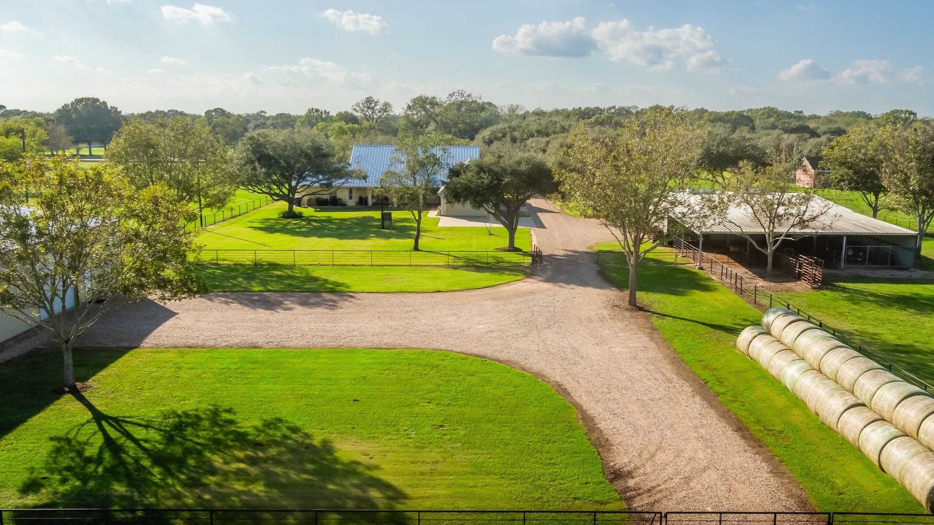 3150 Holmes Road Road, Richmond, TX 77406 Over 6,500 feet of durable pipe fencing enhances privacy and security.