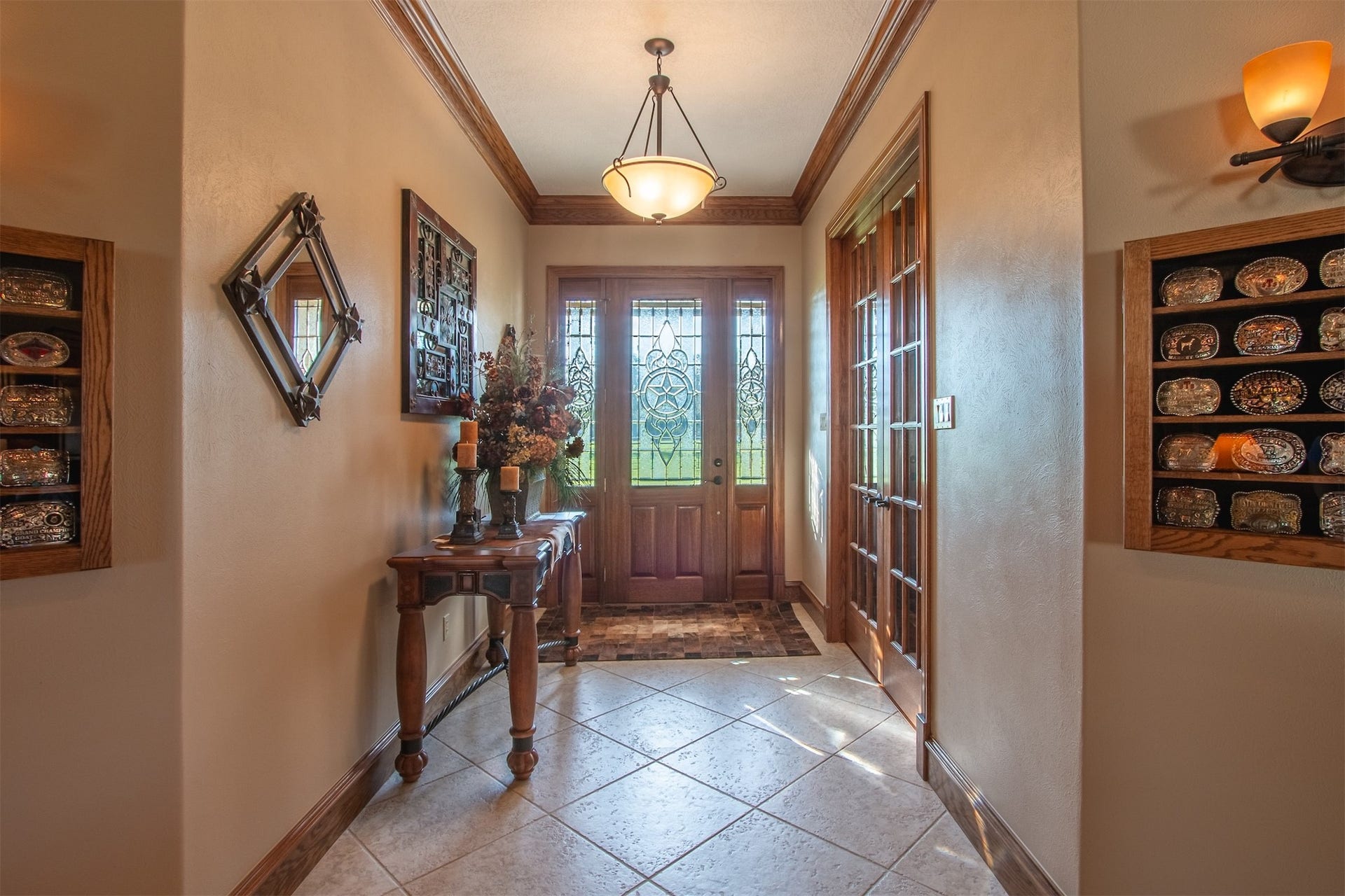 3150 Holmes Road Road, Richmond, TX 77406 Elegant entryway featuring stylish diagonal tile design.