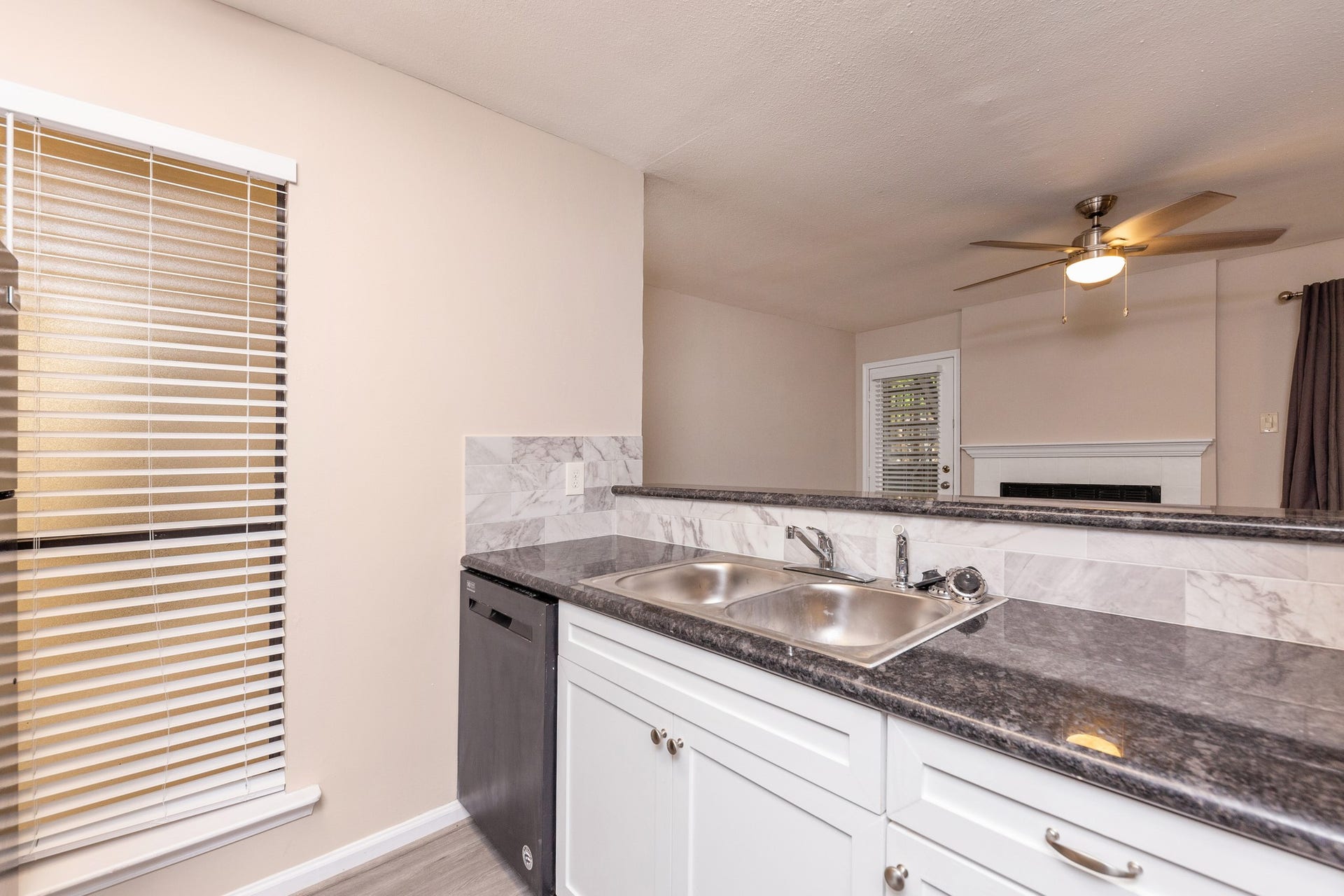 Looking out from the kitchen into the family room, this space is ideal for hosting guests.