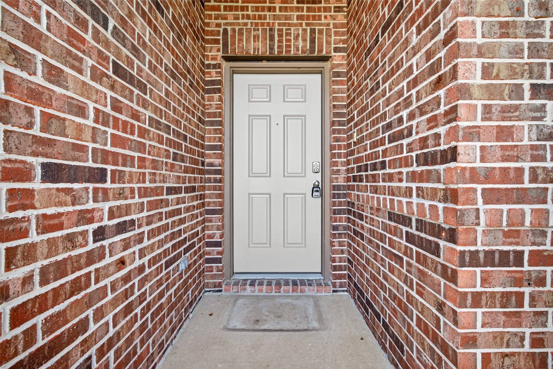 3002 Lightles Manor Court, Katy, TX 77494 Front door leading to the home with brick elevation.