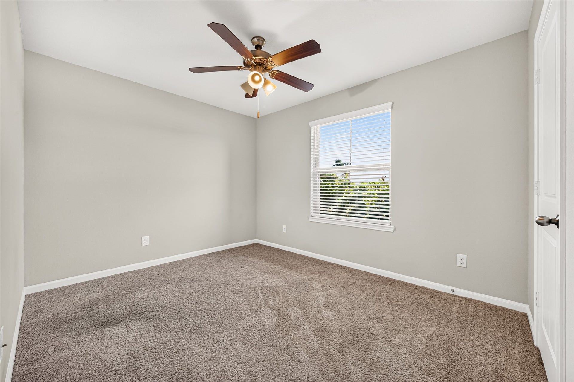 3002 Lightles Manor Court, Katy, TX 77494 Secondary bedroom has carpet throughout.