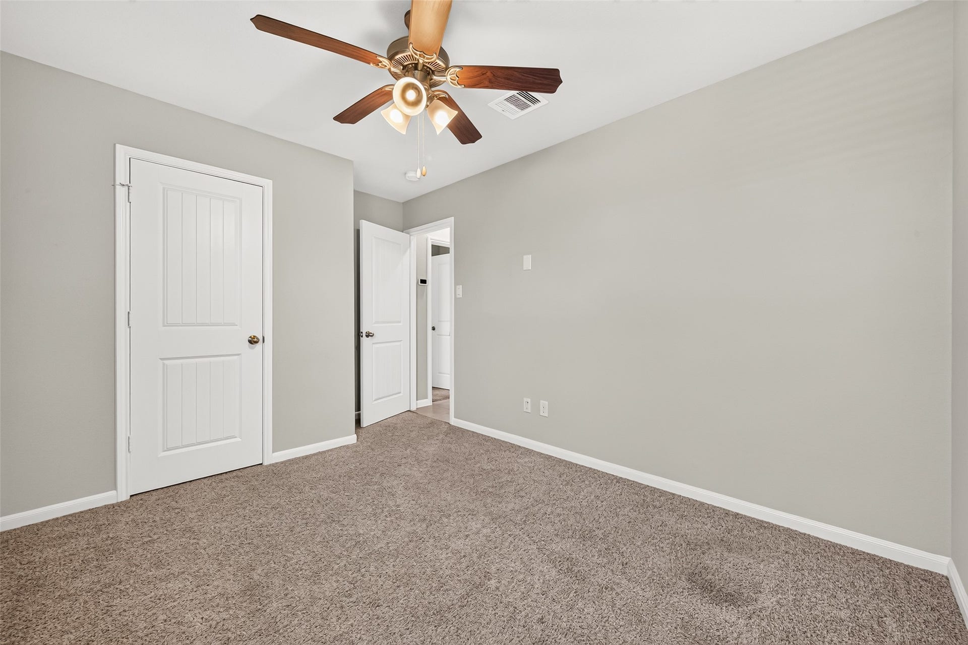 3002 Lightles Manor Court, Katy, TX 77494 Secondary bedroom has carpet throughout.