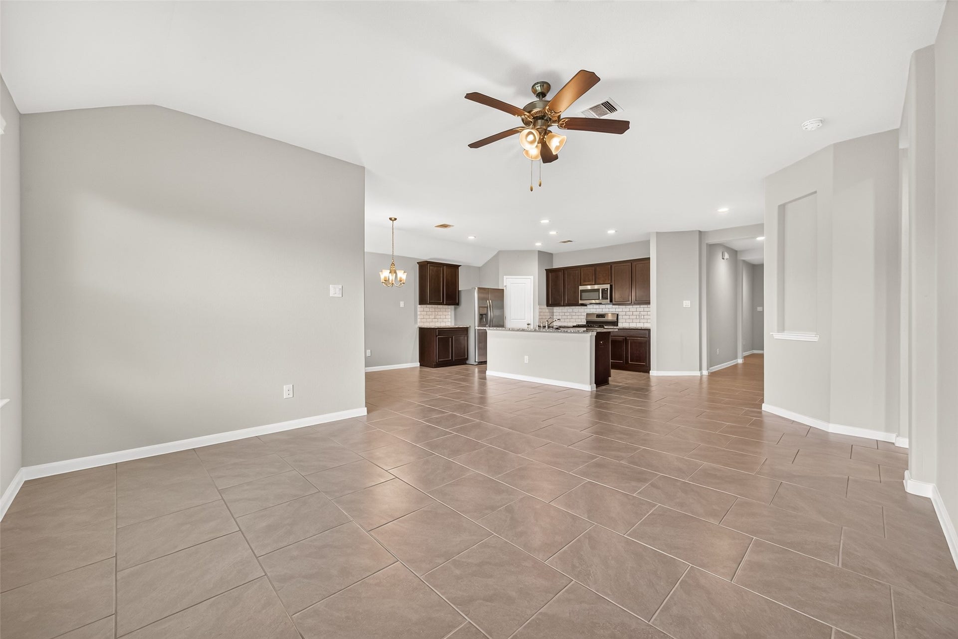 3002 Lightles Manor Court, Katy, TX 77494 Kitchen is open to the living area.