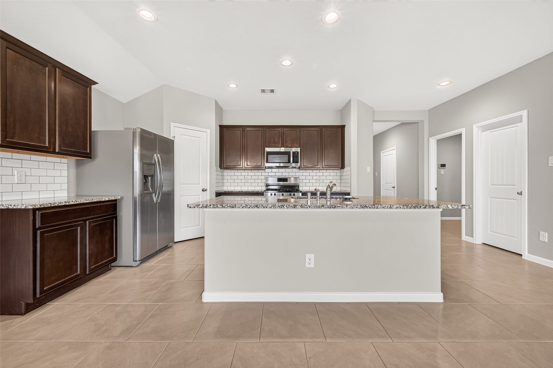 3002 Lightles Manor Court, Katy, TX 77494 Big dark cabinets for all your storage needs.