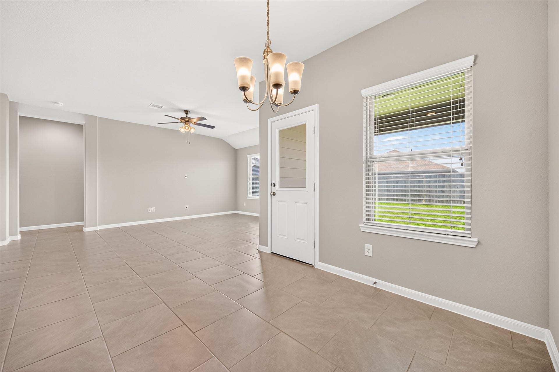 3002 Lightles Manor Court, Katy, TX 77494 Breakfast area has tiles and big windows for naatural sunlight.