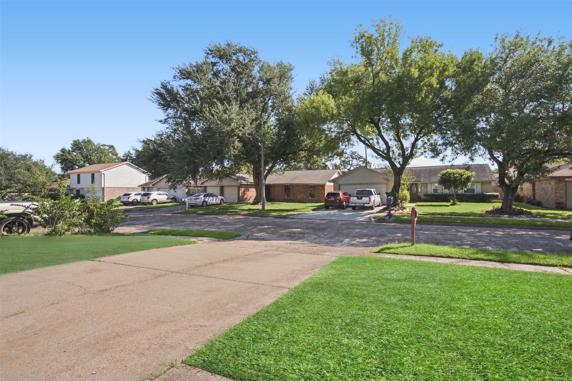 1323 Castle Glen Drive, Houston, TX 77015 Come home to an established residential setting with mature trees, neighboring homes, and a welcoming streetscape that adds to the property's appeal.