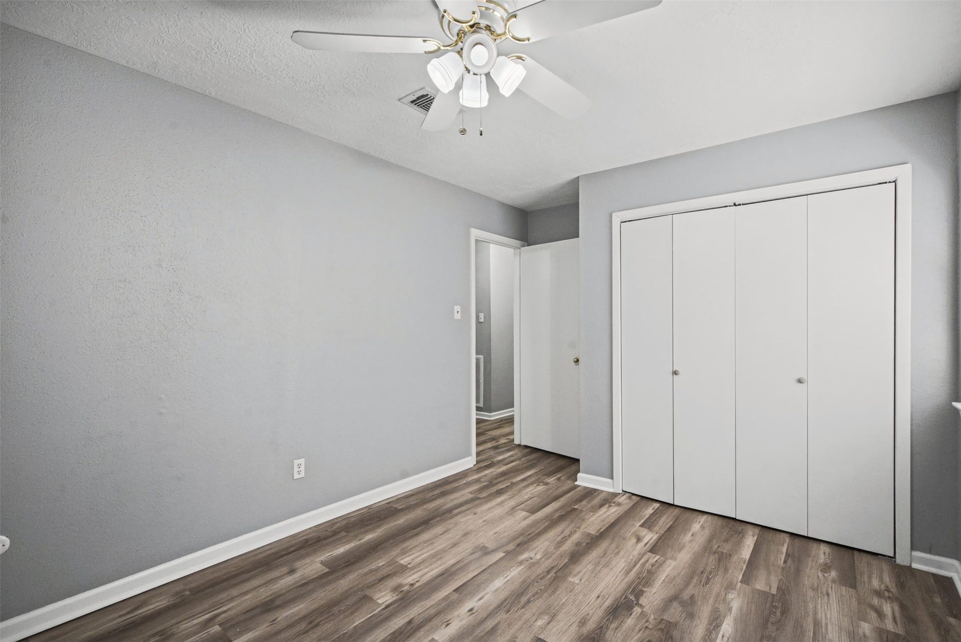 1323 Castle Glen Drive, Houston, TX 77015 A blank canvas for your next chapter! With built-in closet storage, wood-look flooring, and room to personalize, this bedroom combines everyday function with endless decorating possibilities.