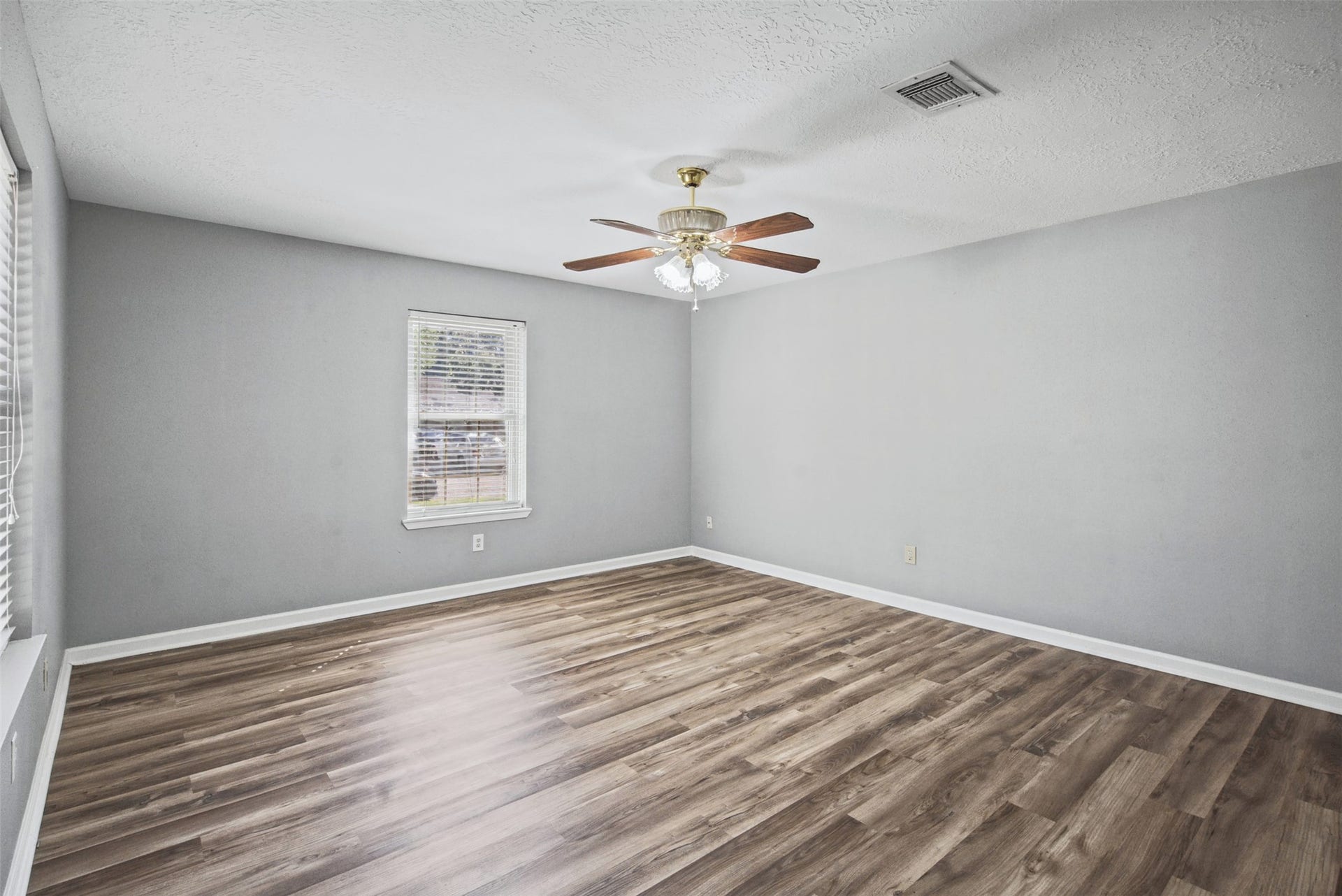 1323 Castle Glen Drive, Houston, TX 77015 A peaceful place to unwind after a long day! This comfortable bedroom features natural light, soft neutral tones, and plenty of possibilities for creating your ideal retreat.