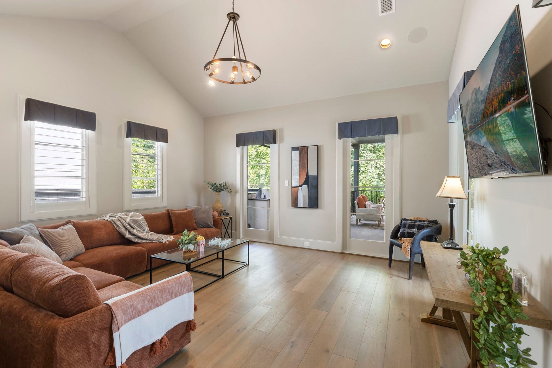 79 Simon Lake Lane, The Woodlands, TX 77381 Versatile media room or flex space with direct access to the backyard.