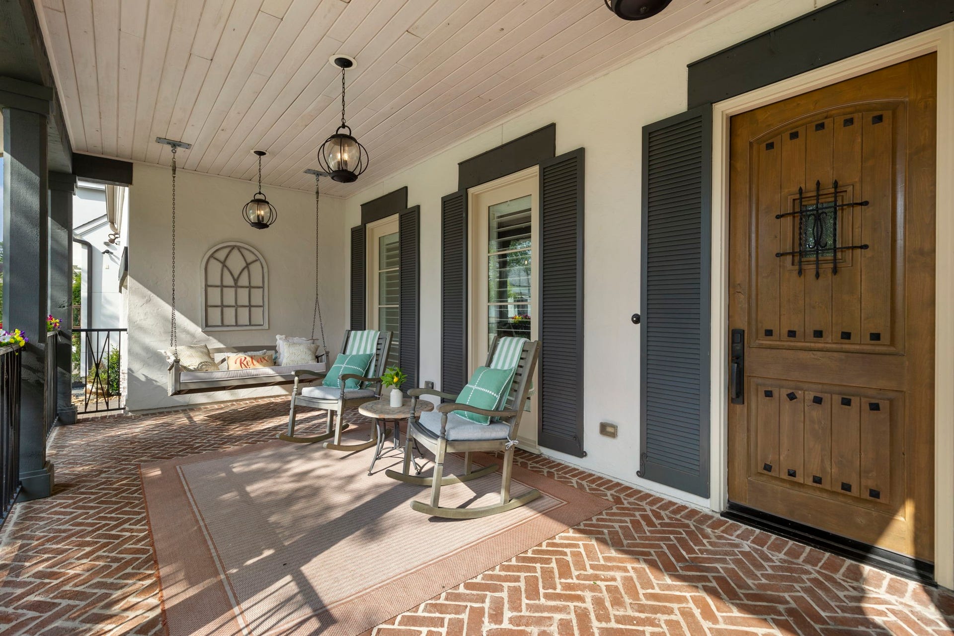 79 Simon Lake Lane, The Woodlands, TX 77381 Relax and unwind on the spacious covered front porch.