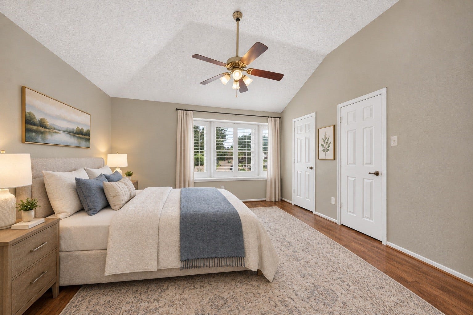 3507 Santa Rosa Lane, Sugar Land, TX 77478 A quiet, spacious upper-level retreat featuring warm wood-look flooring, high ceilings, and lovely natural light. (virtual staged)